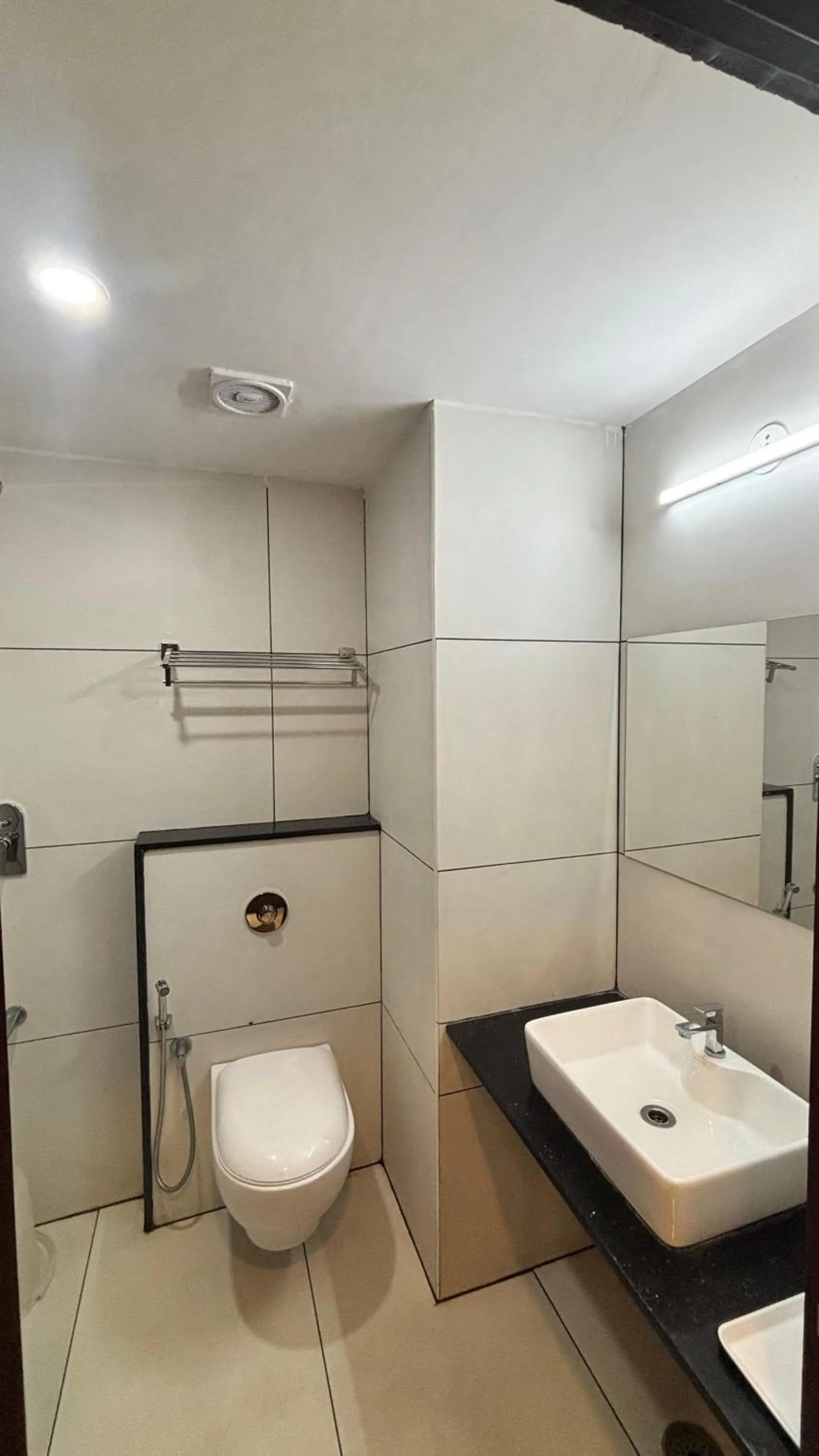 Shower in Hotel Kalyan Suites