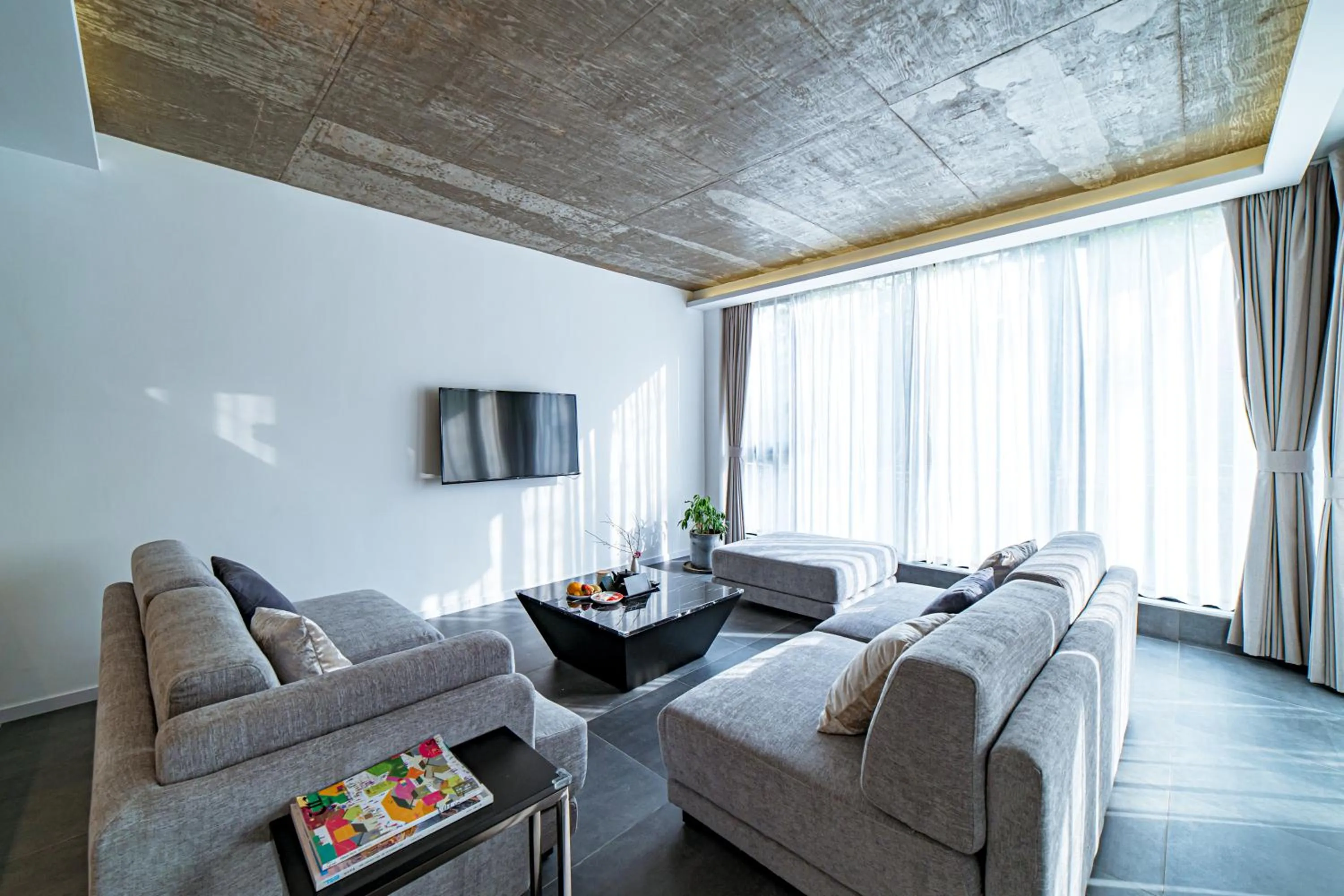 Living room in Nian hotel & resorts