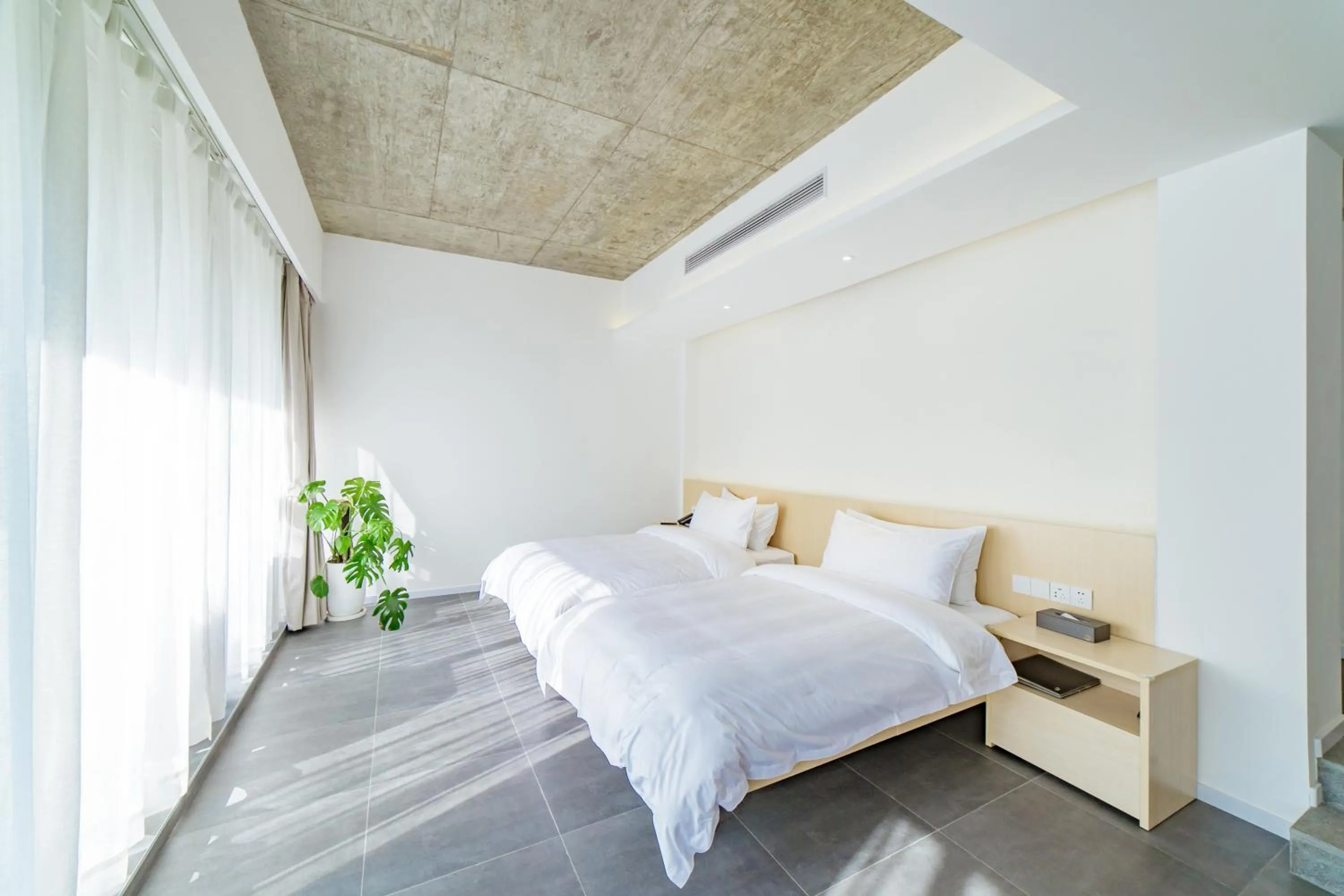 Bed in Nian hotel & resorts