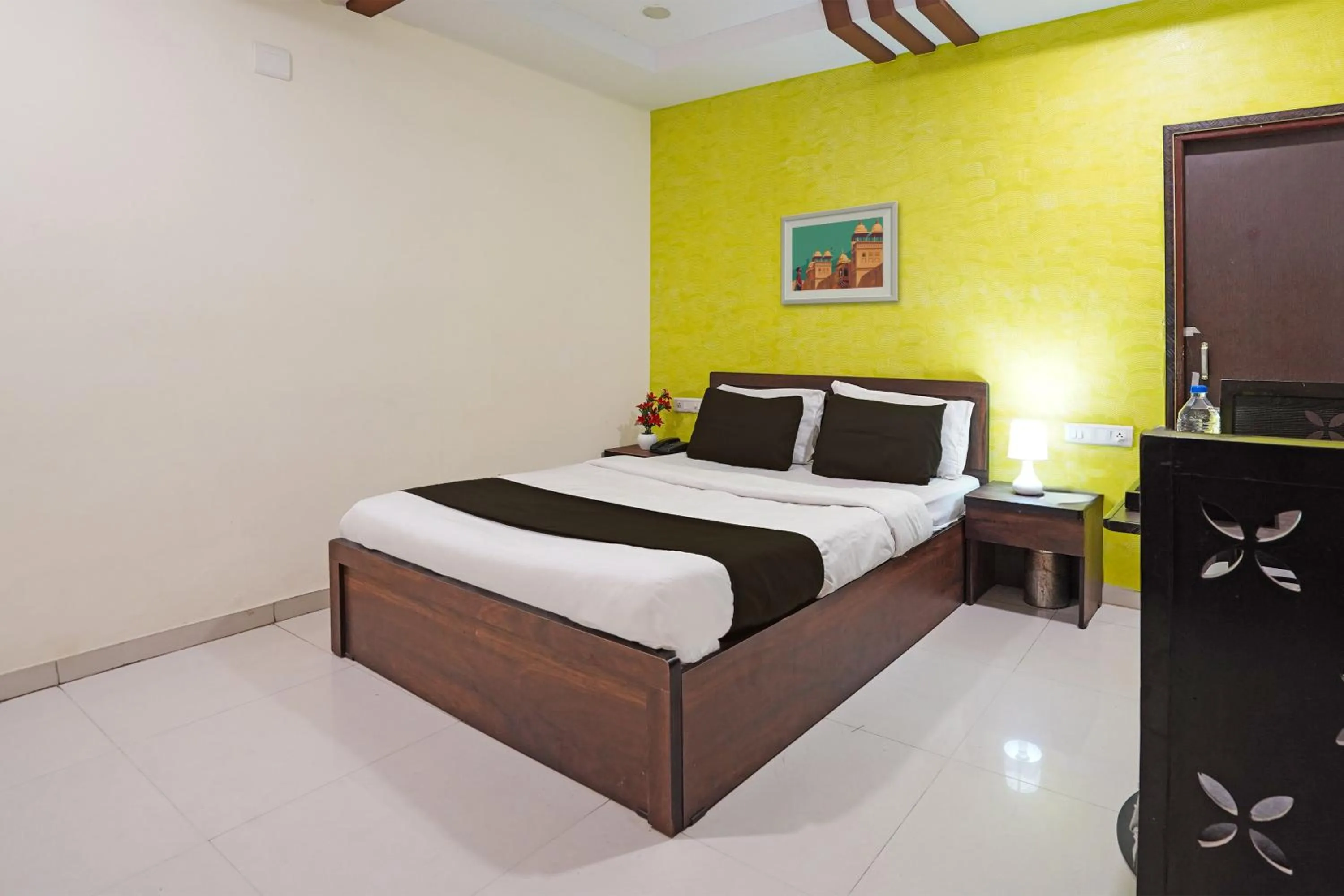 Bedroom in Hotel O Poonam Palace