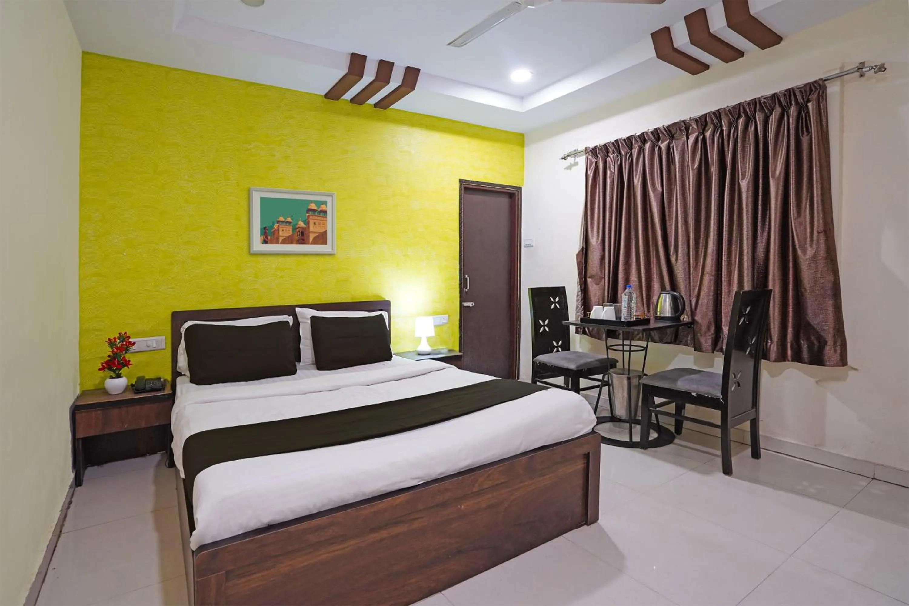 Bedroom in Hotel O Poonam Palace