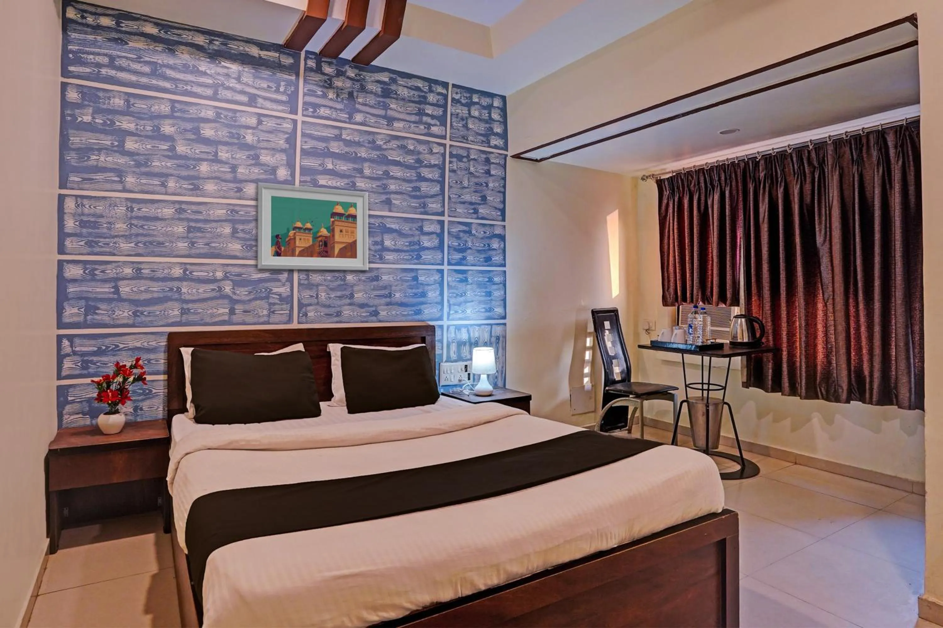 Bedroom in Hotel O Poonam Palace