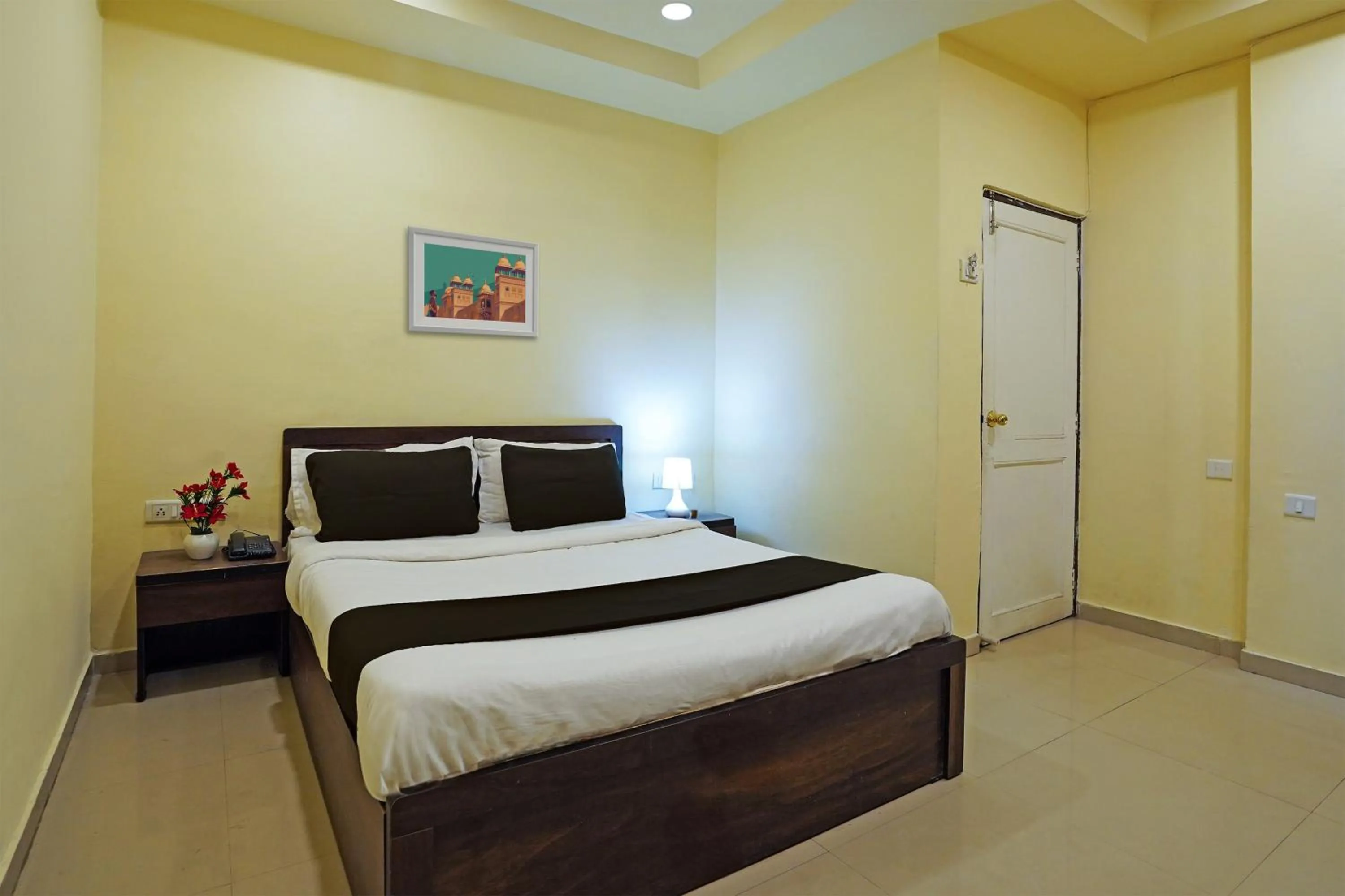 Bedroom in Hotel O Poonam Palace