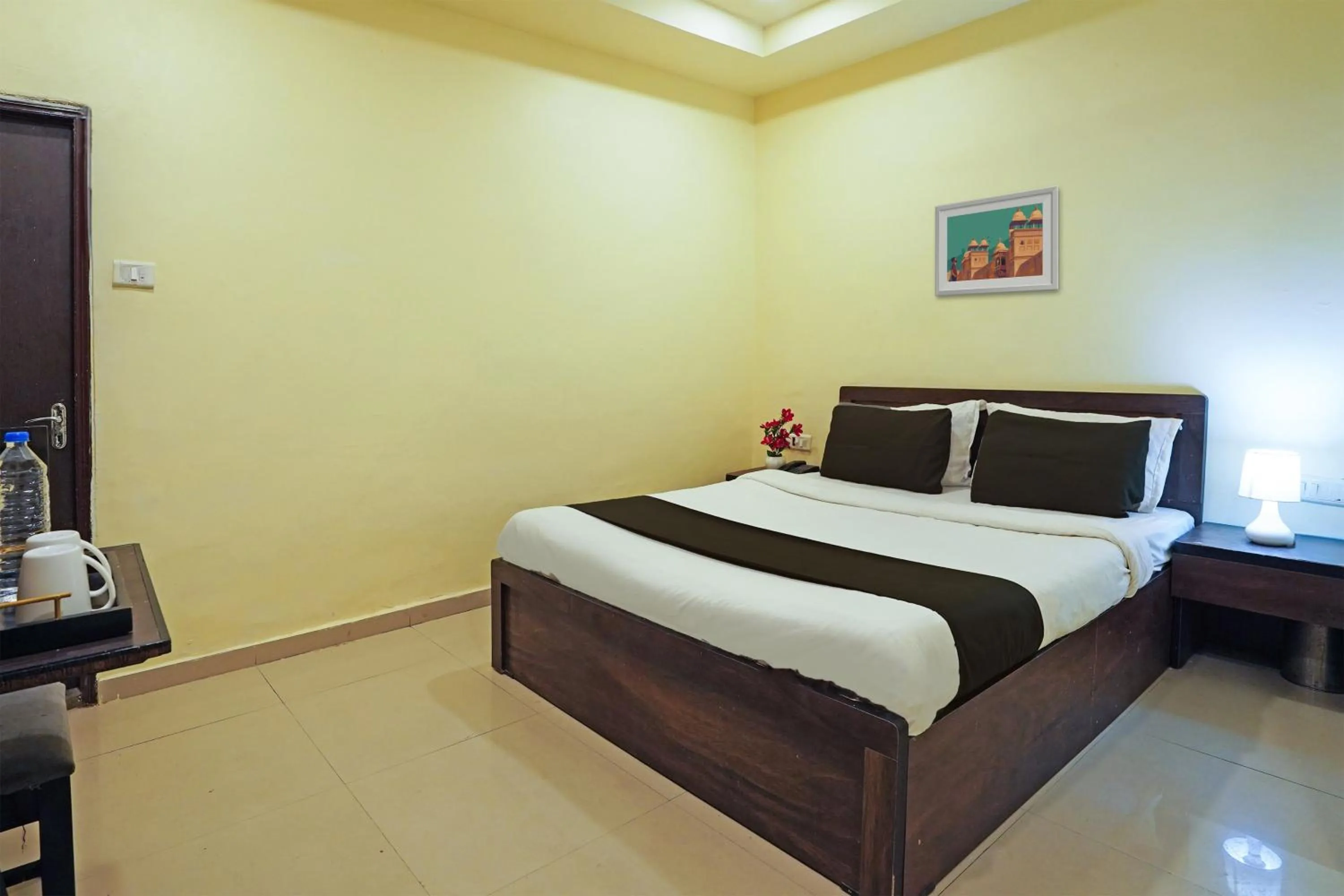 Bedroom in Hotel O Poonam Palace