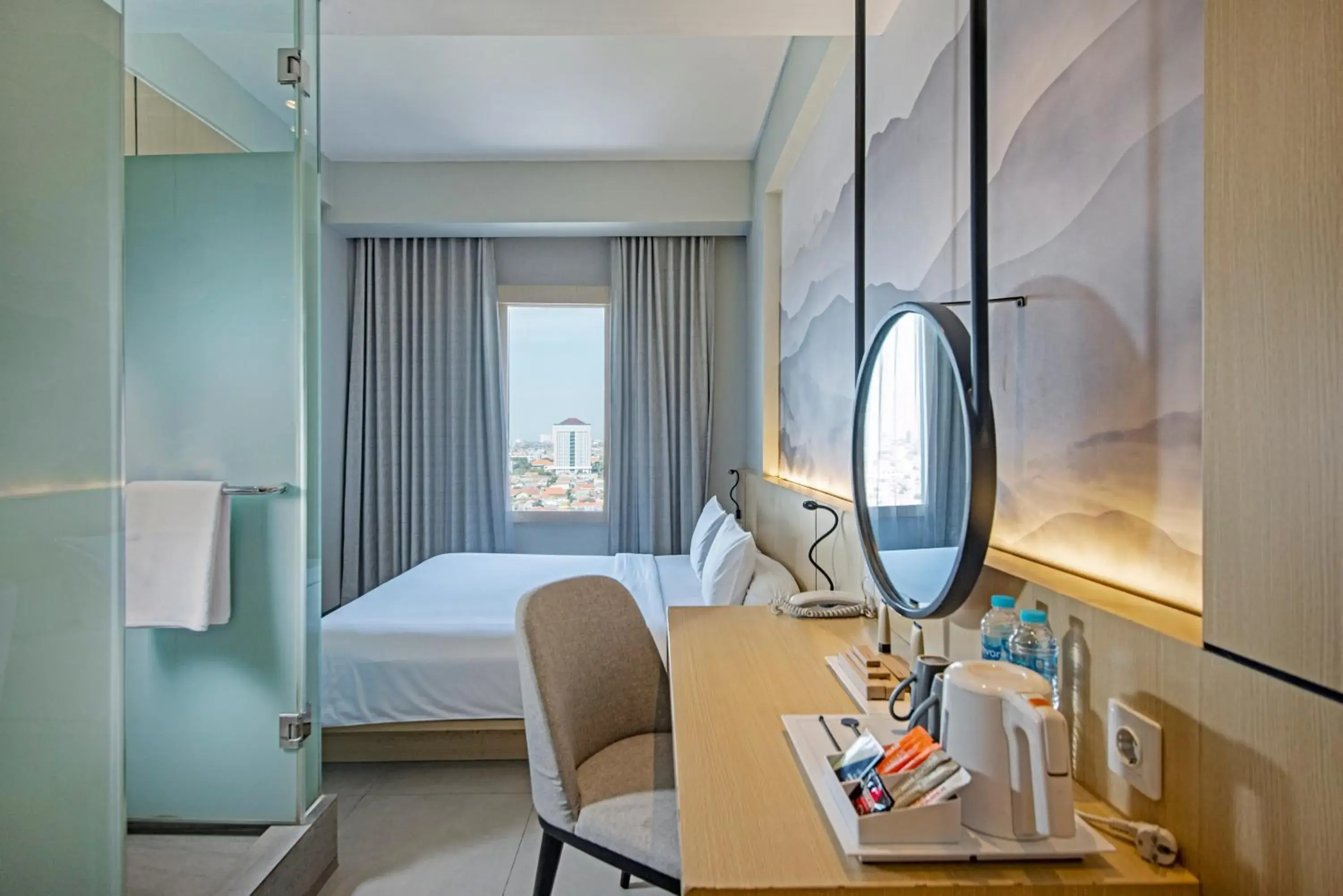 Smart Room in HARRIS Hotel & Conventions Gubeng Smart Room in HARRIS Hotel & Conventions Gubeng