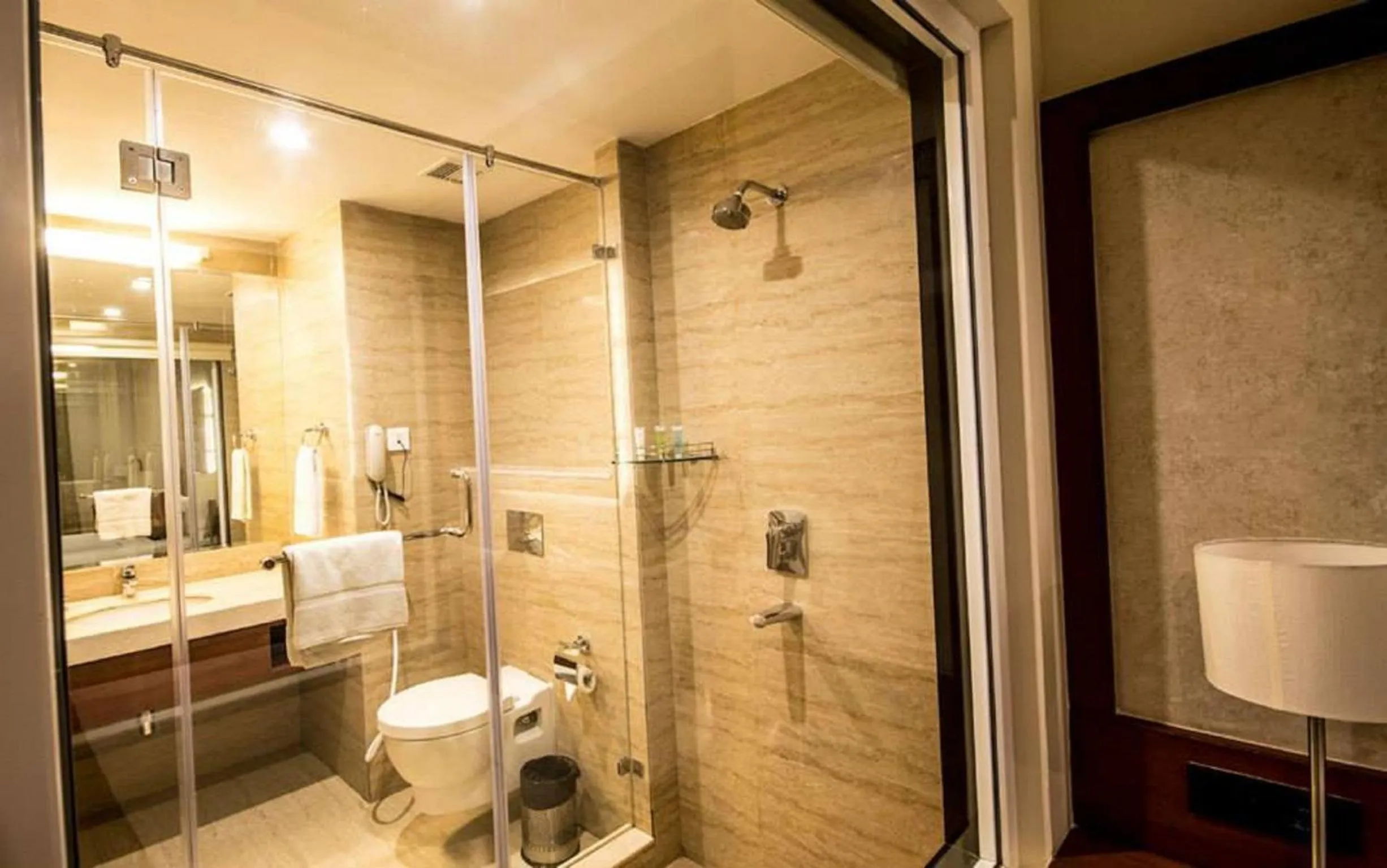 Shower in The Altruist Business Hotel Hitech