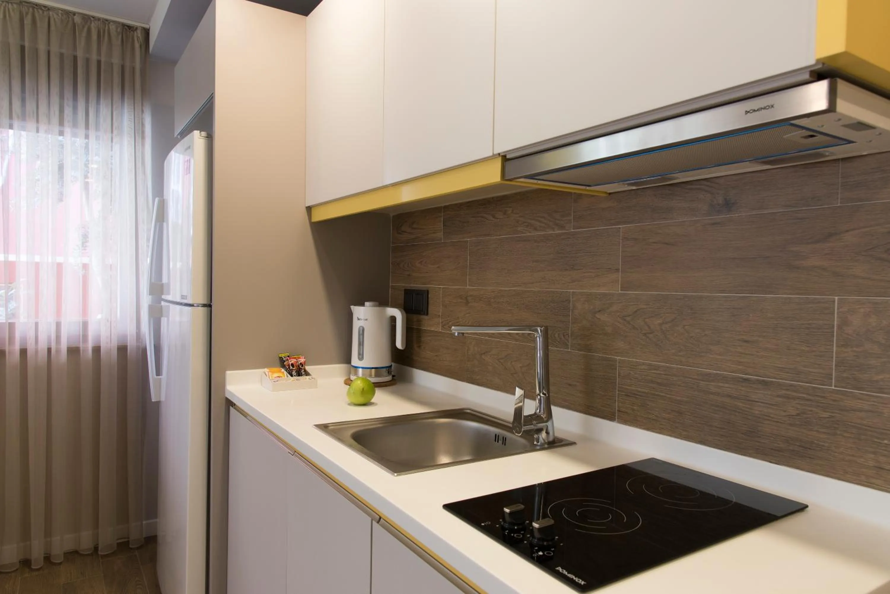 Kitchen or kitchenette in Trend Suites