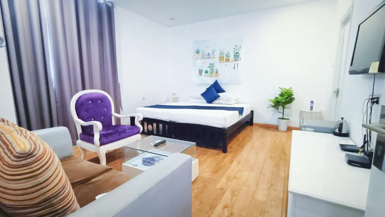 Bed in Queen Central Apartment Hotel