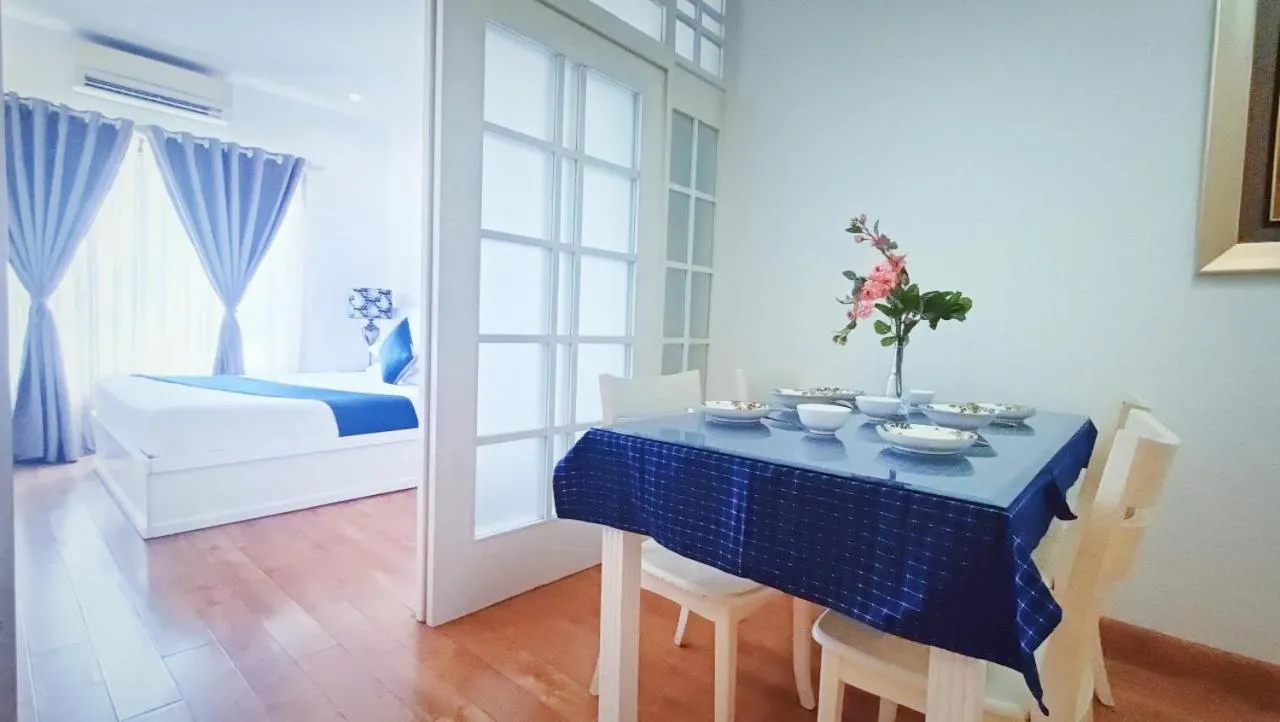 Bed in Queen Central Apartment Hotel