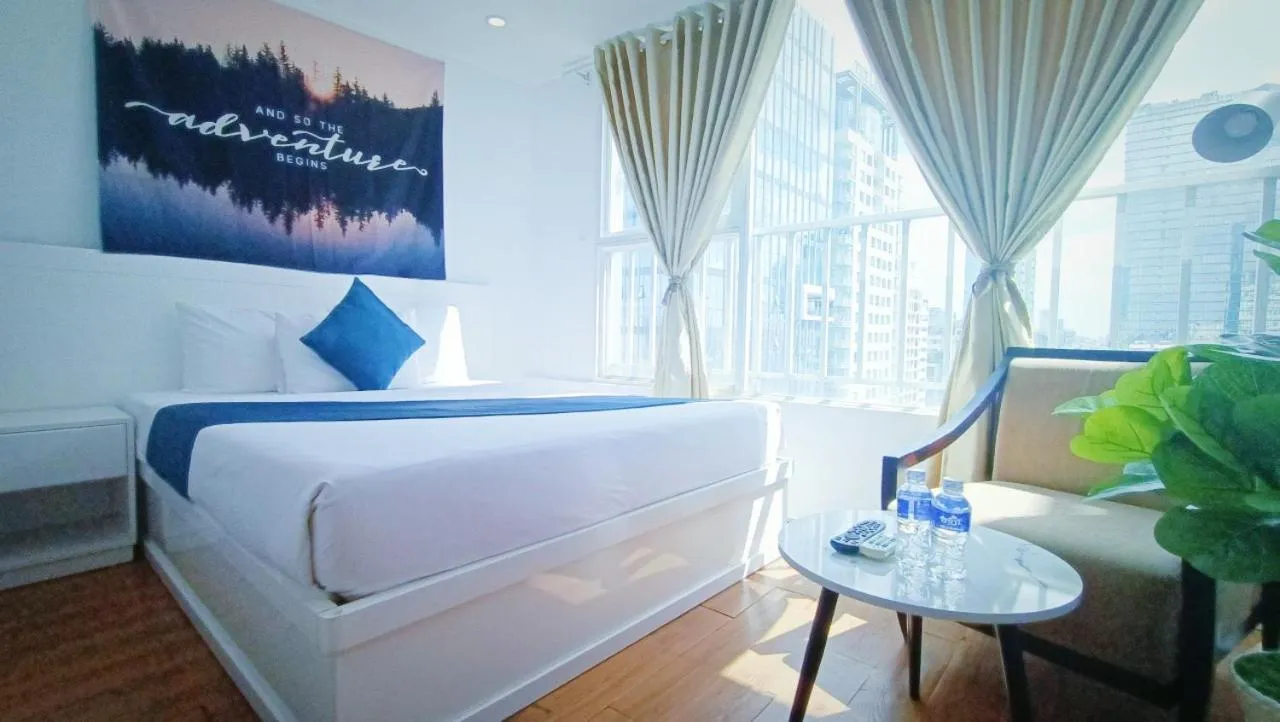 Bed in Queen Central Apartment Hotel