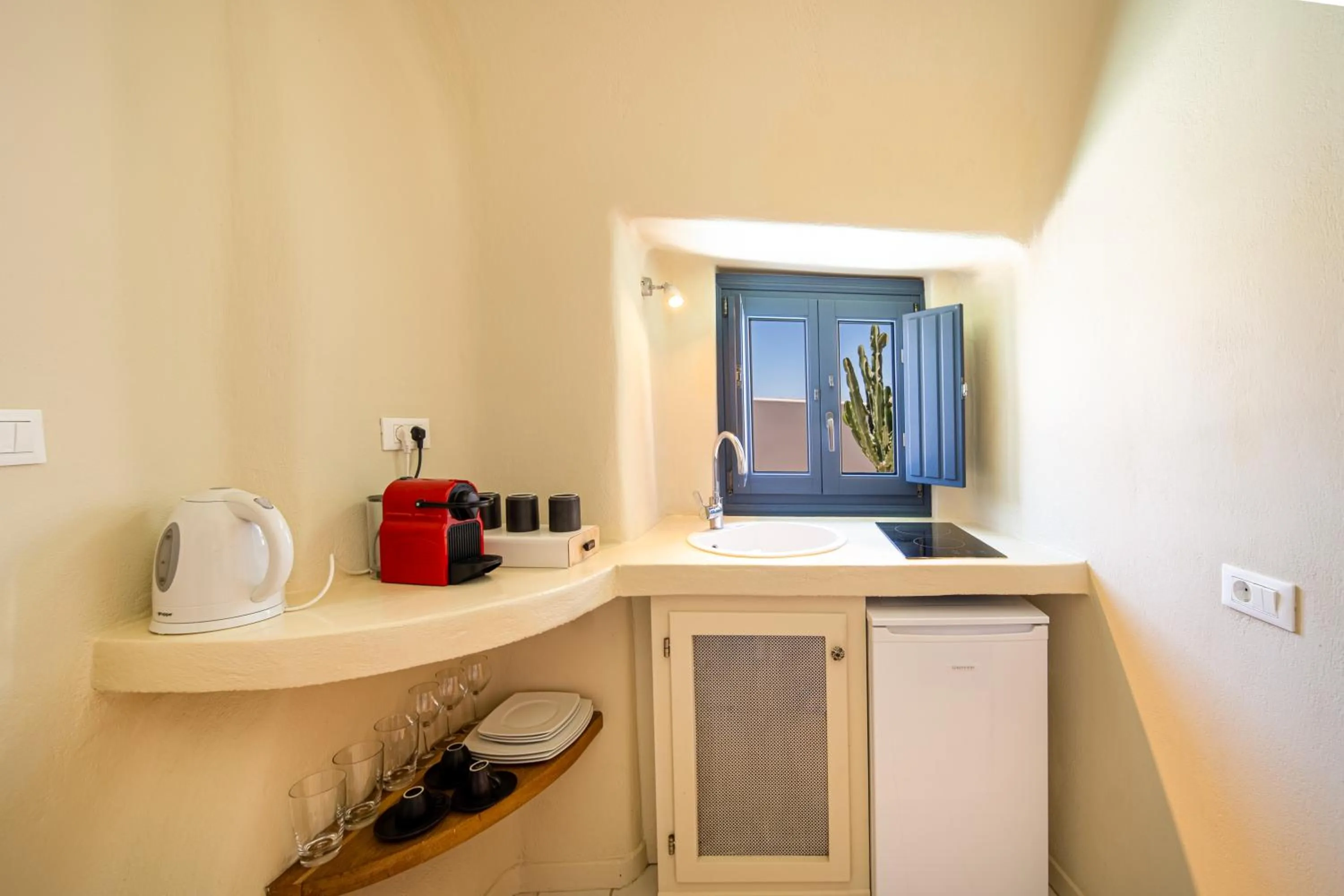Kitchen or kitchenette in Luna Santorini Suites