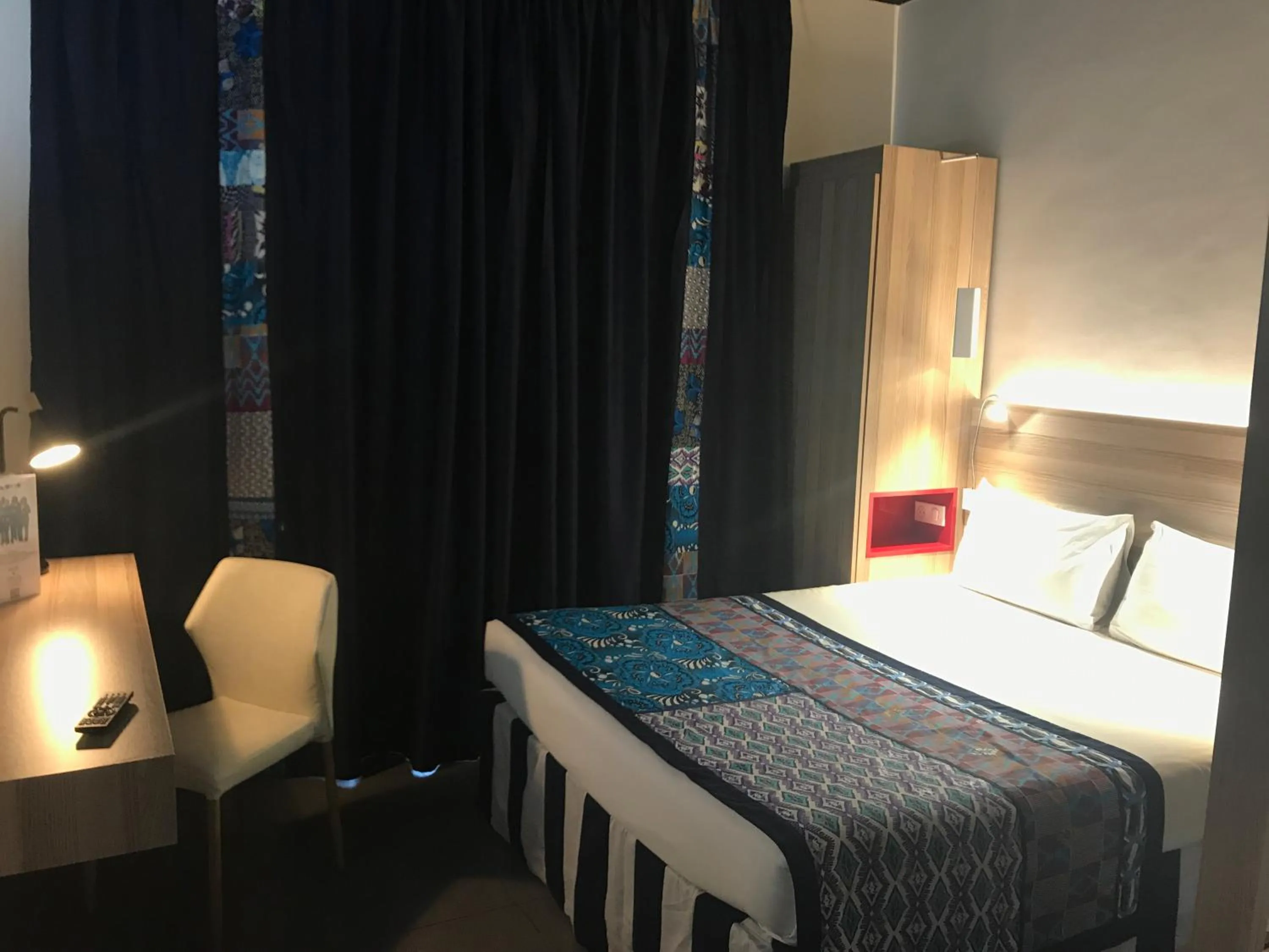 Photo of the whole room, Bed in ONOMO Hotel Lomé