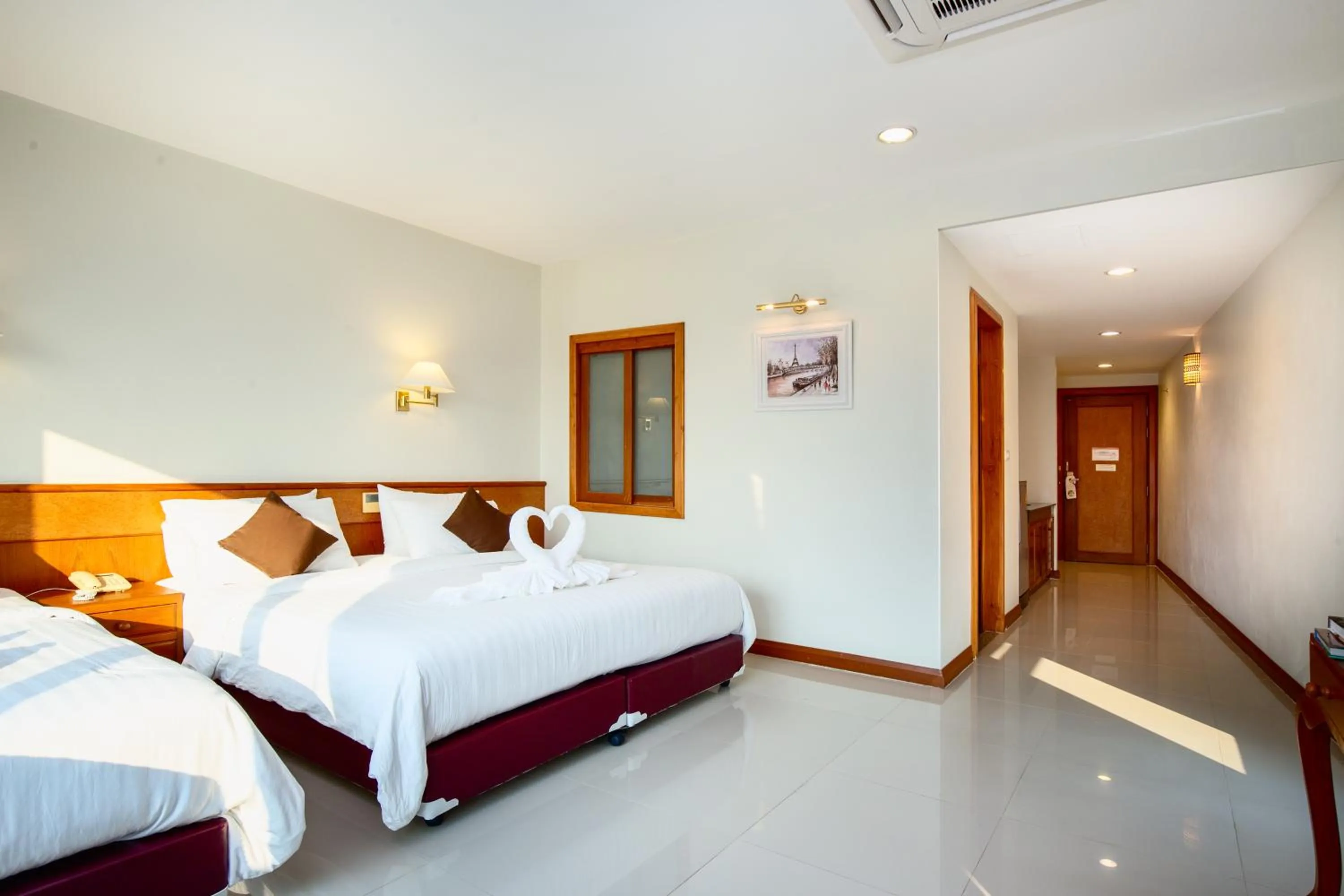 Bed in Kanchanaburi City Hotel