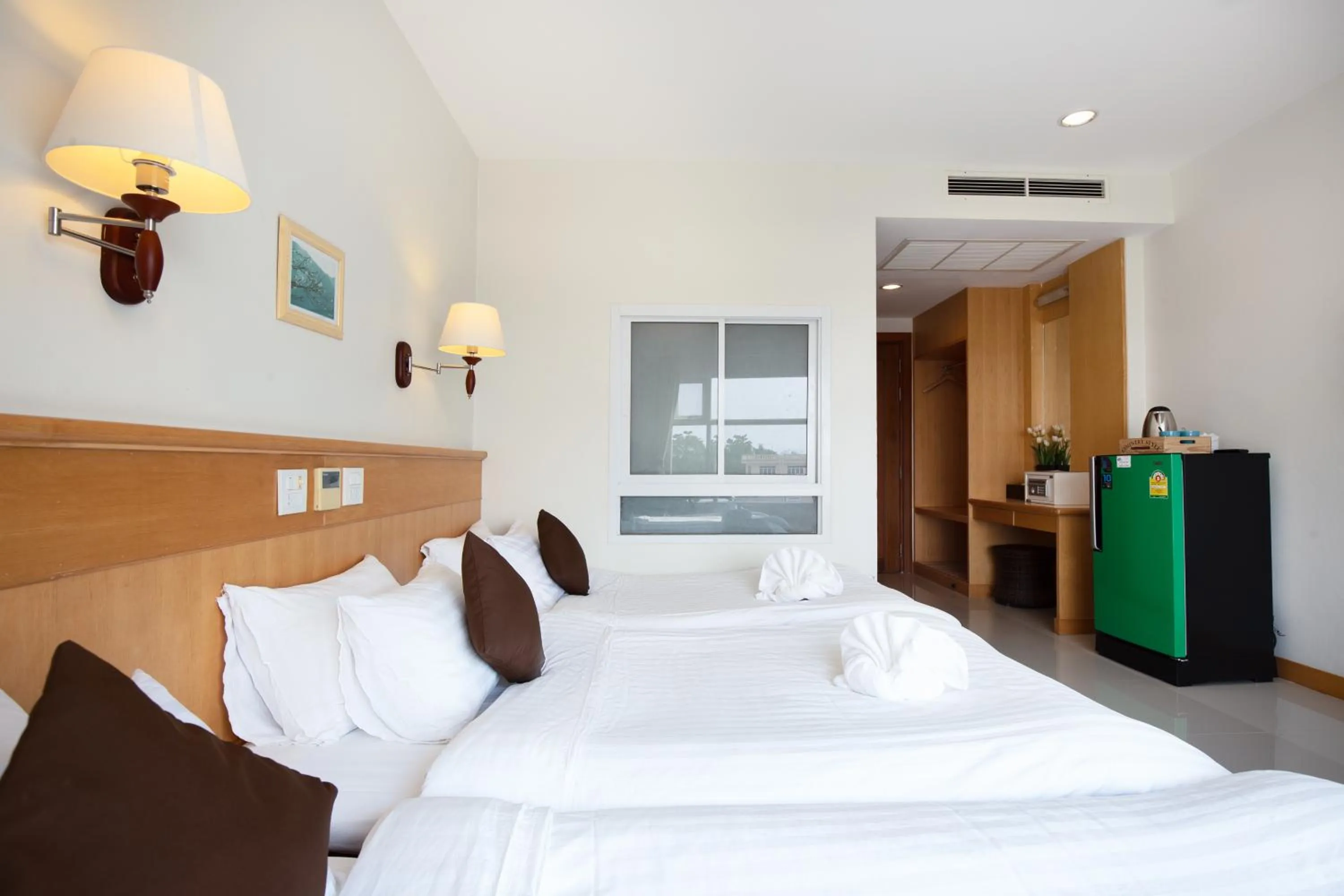 Bed in Kanchanaburi City Hotel