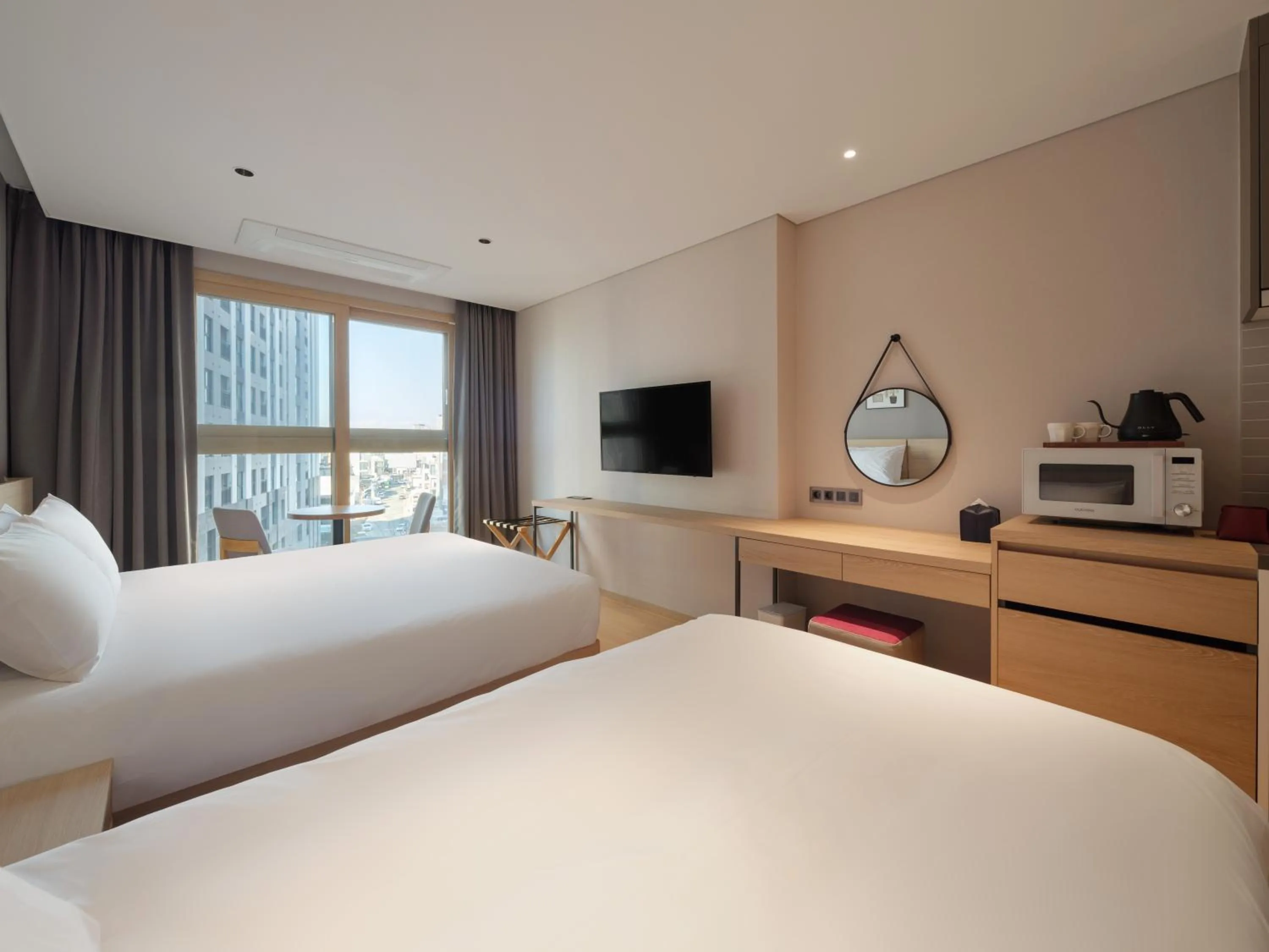 Bed in Le Collective Sokcho Central