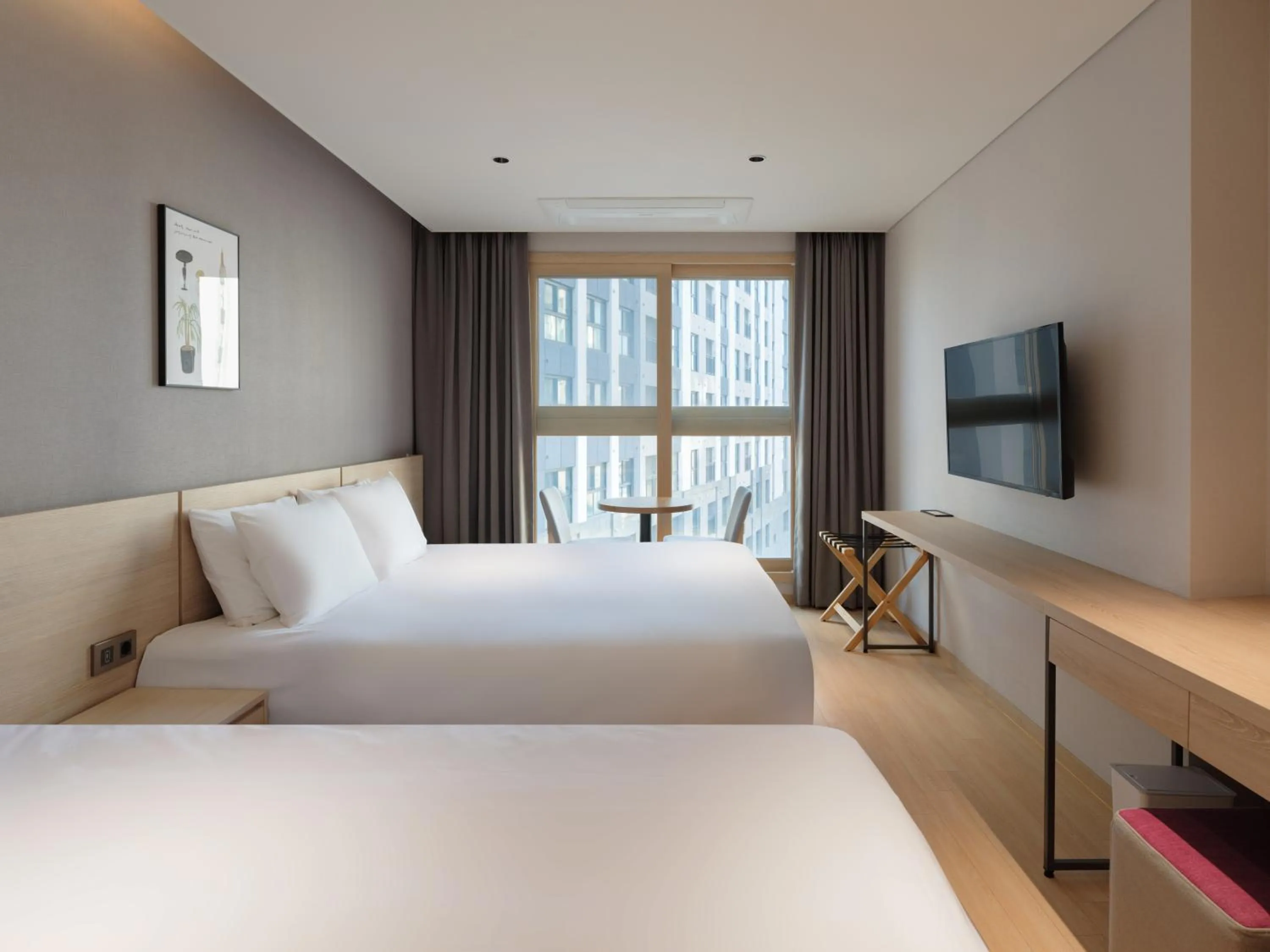 Bed in Le Collective Sokcho Central