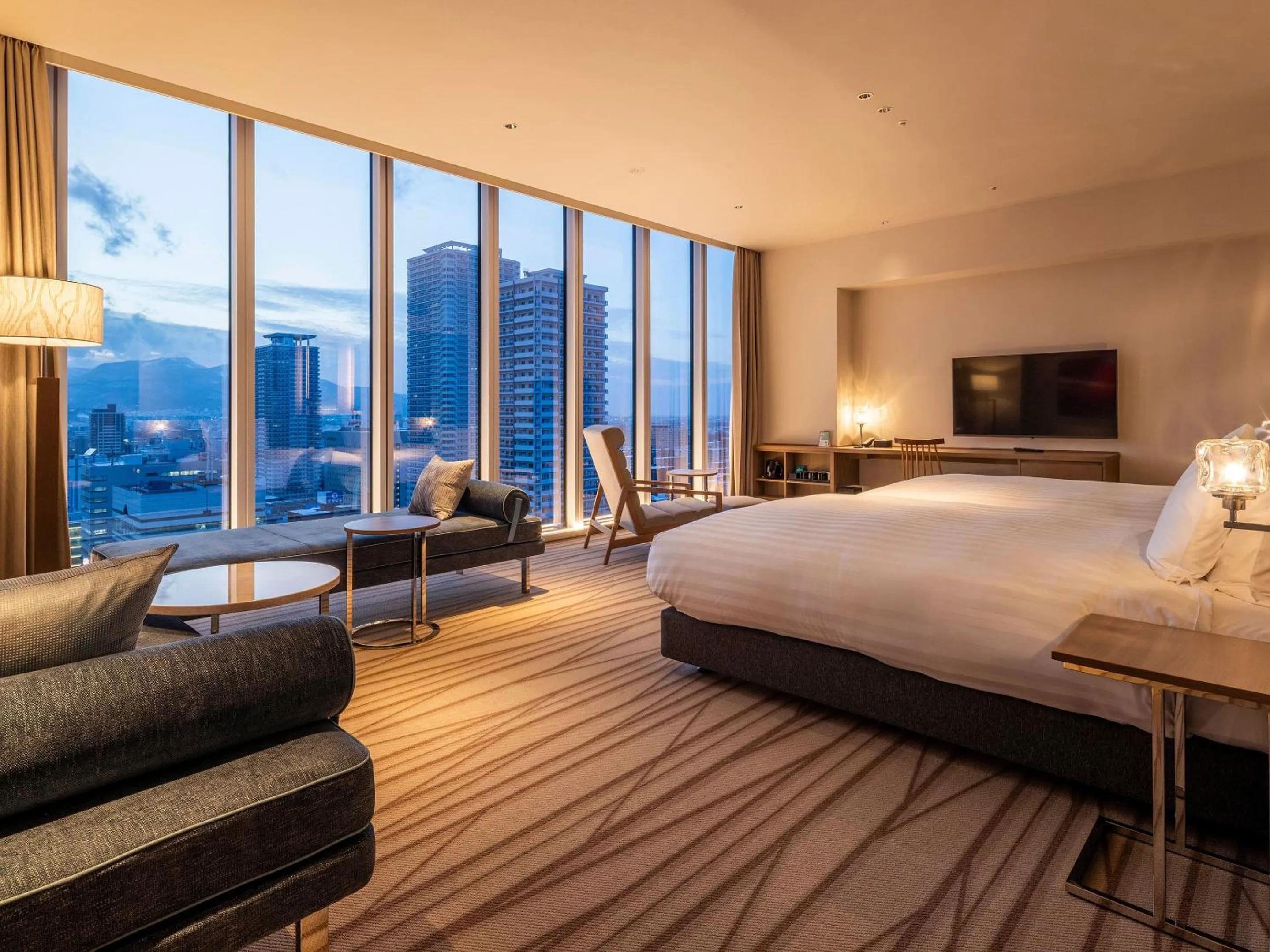 Photo of the whole room, Bed in SAPPORO HOTEL by GRANBELL
