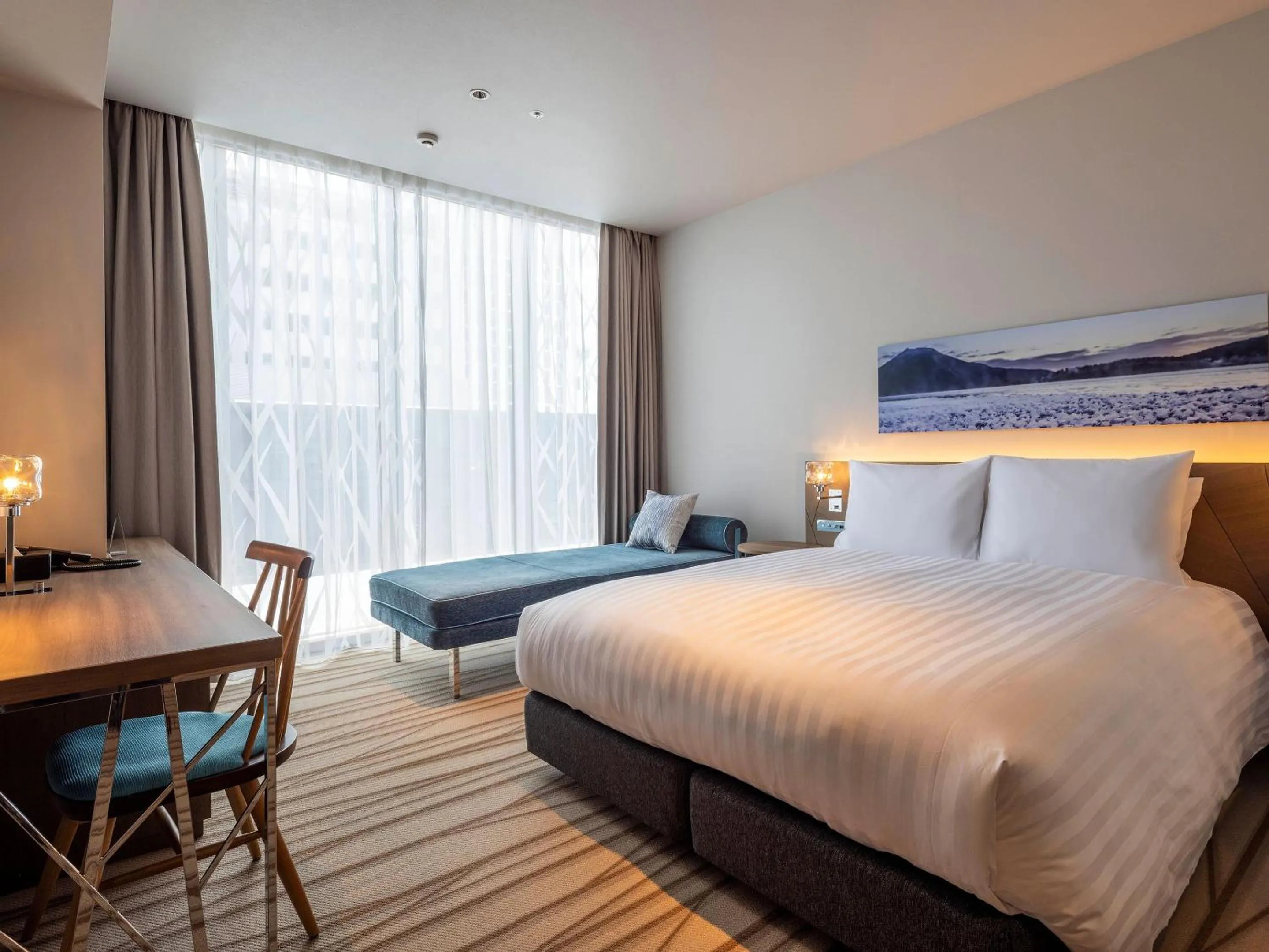 Bed in SAPPORO HOTEL by GRANBELL