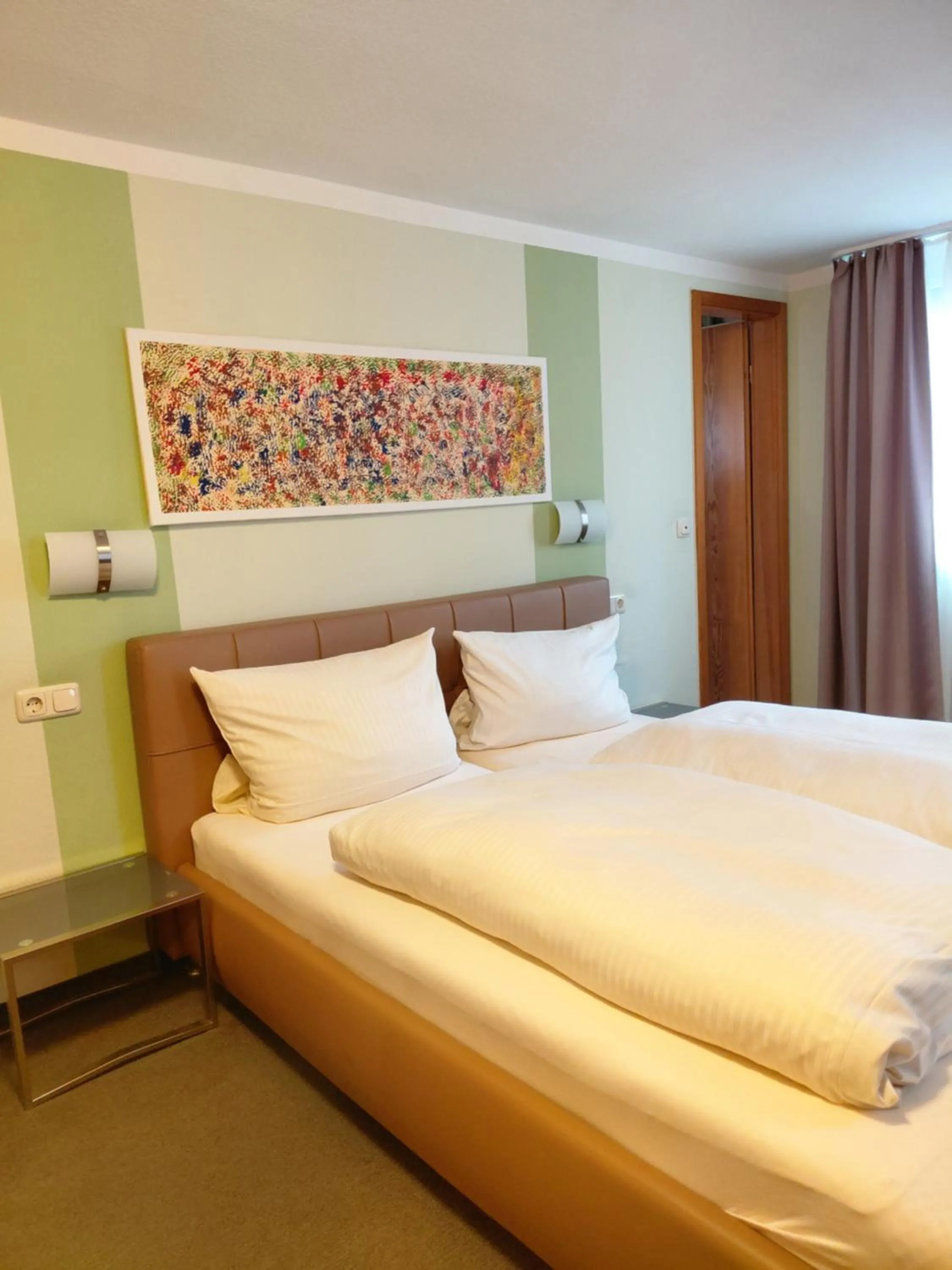 Bed in Gästehaus Engelgasse Herzogenaurach