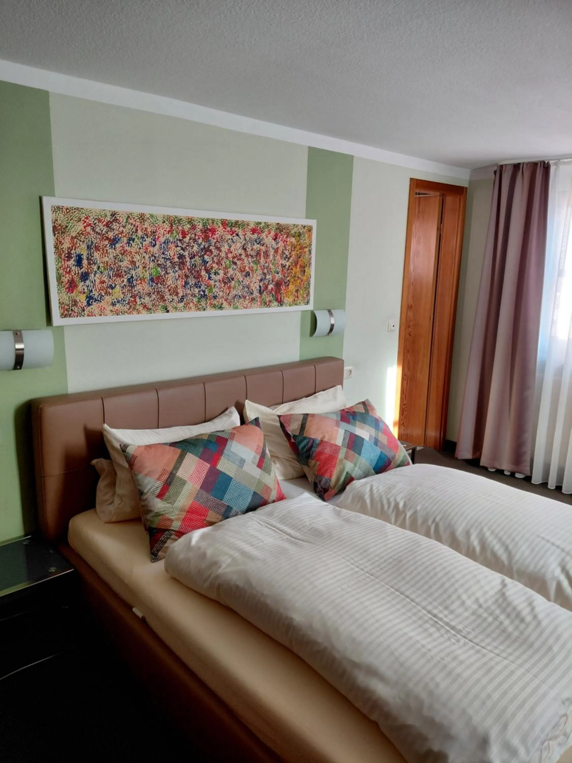 Bed in Gästehaus Engelgasse Herzogenaurach