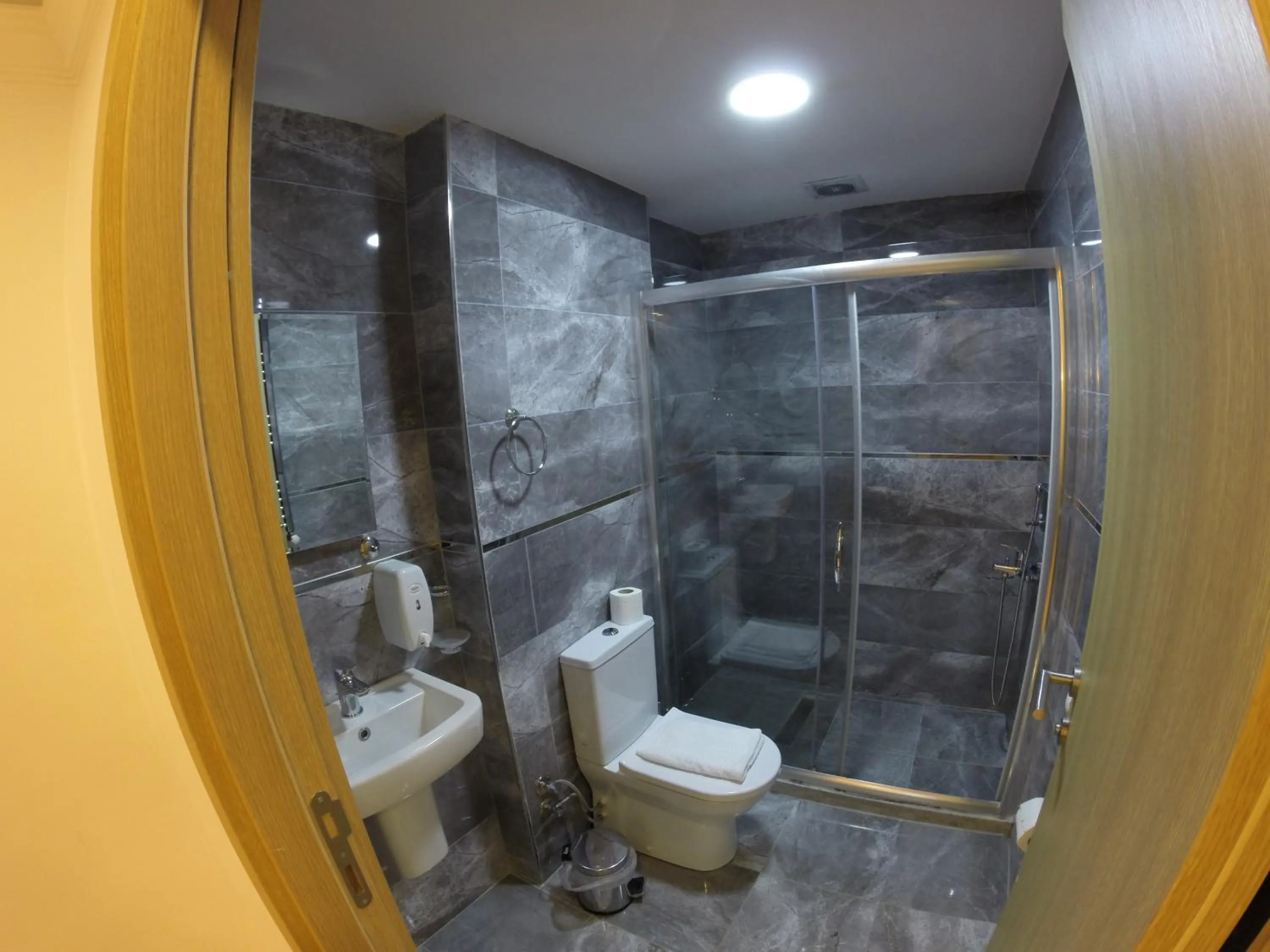 Toilet in Meydan Suites