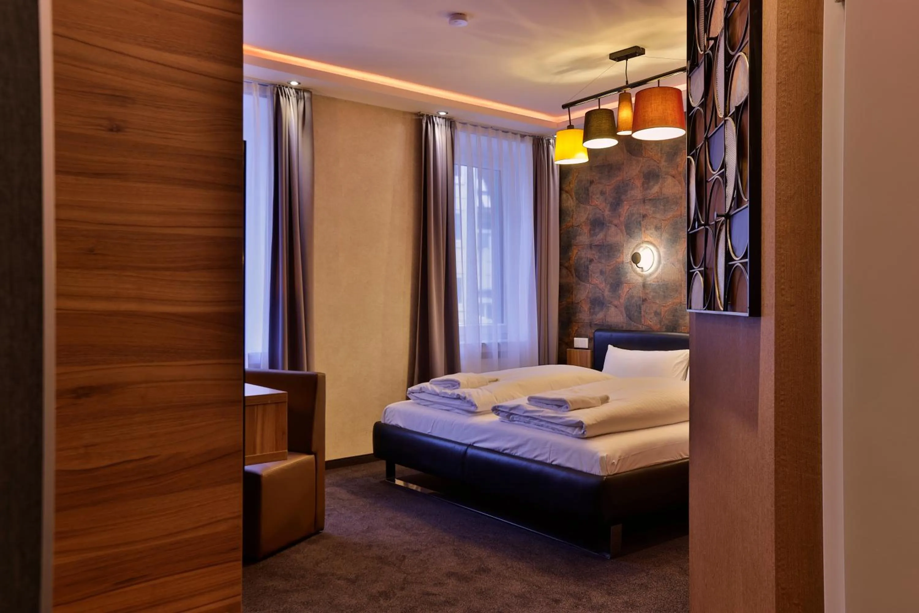 Shower, Bed in Stay-Inn Bielefeld Zentrum