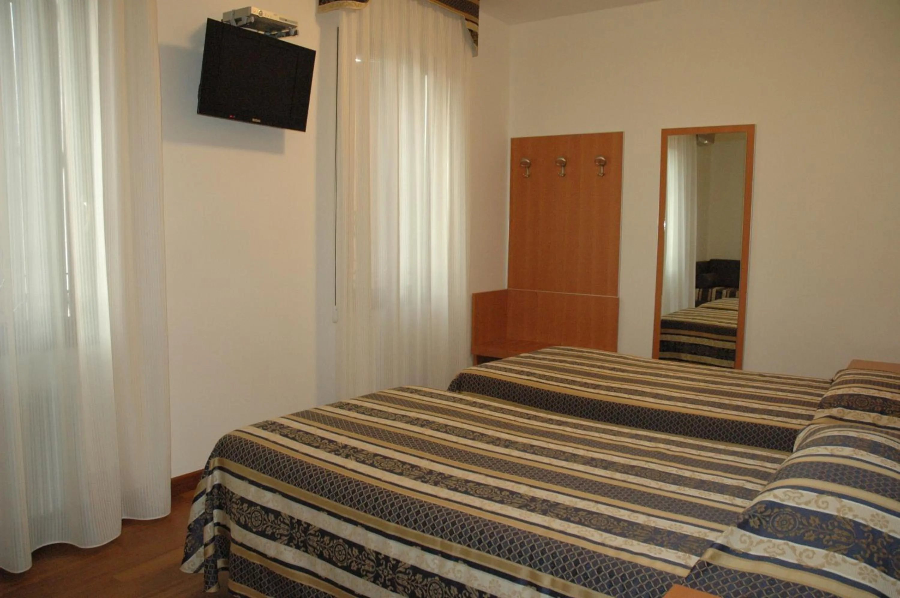 Photo of the whole room, Bed in Hotel Ristorante Dotto