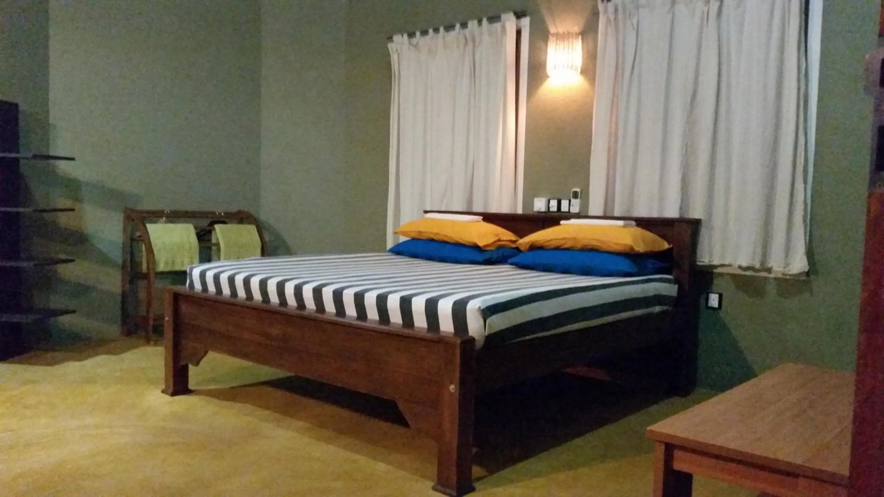 Photo of the whole room, Bed in My Village