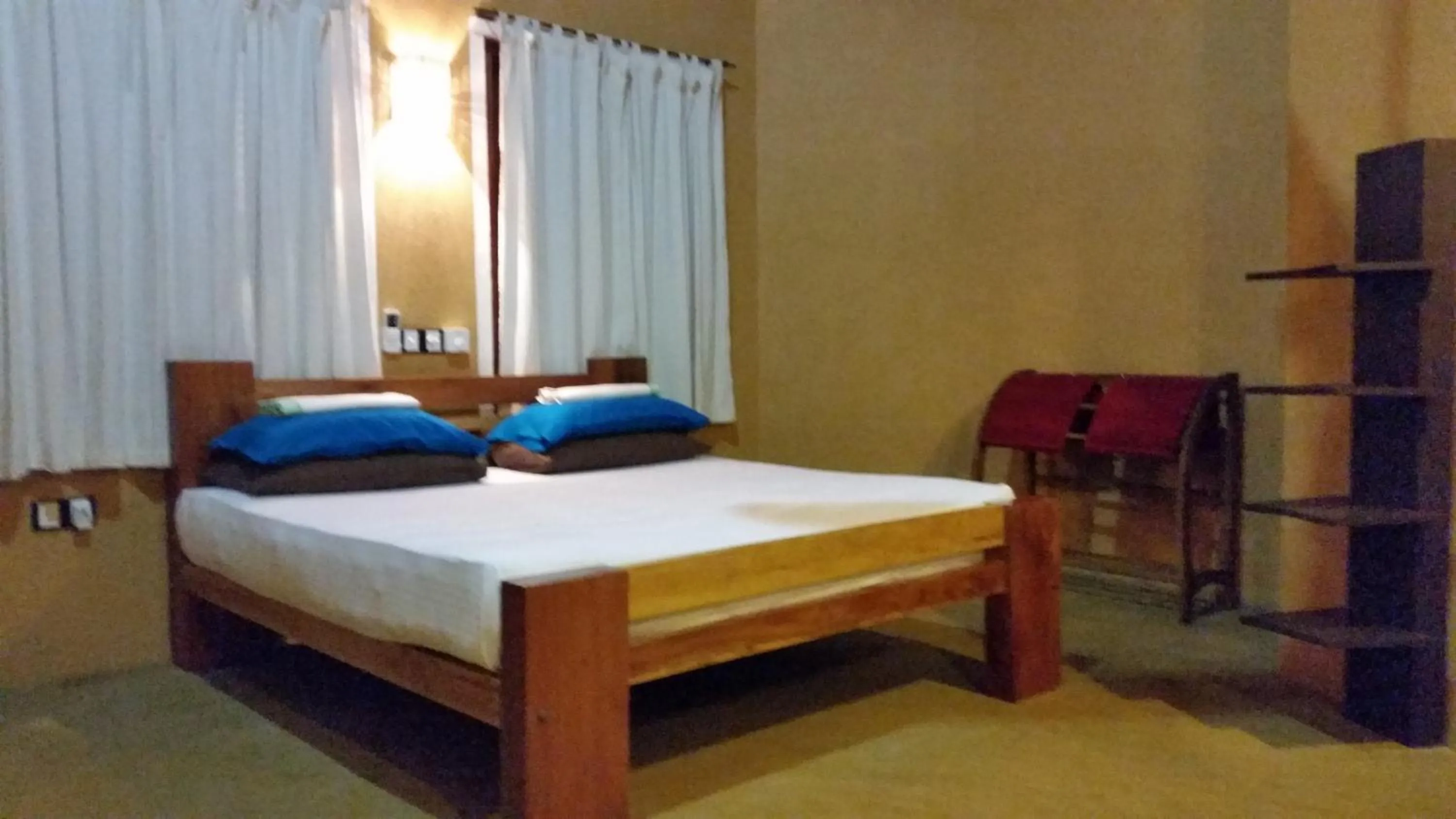 Photo of the whole room, Bed in My Village