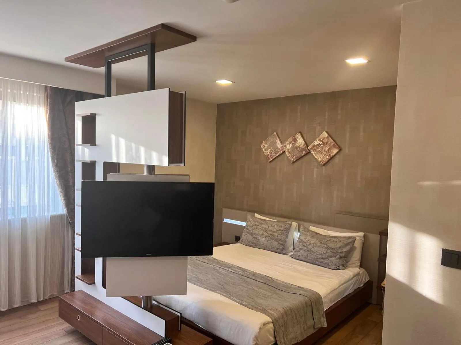 Bed in Liv Suit Hotel