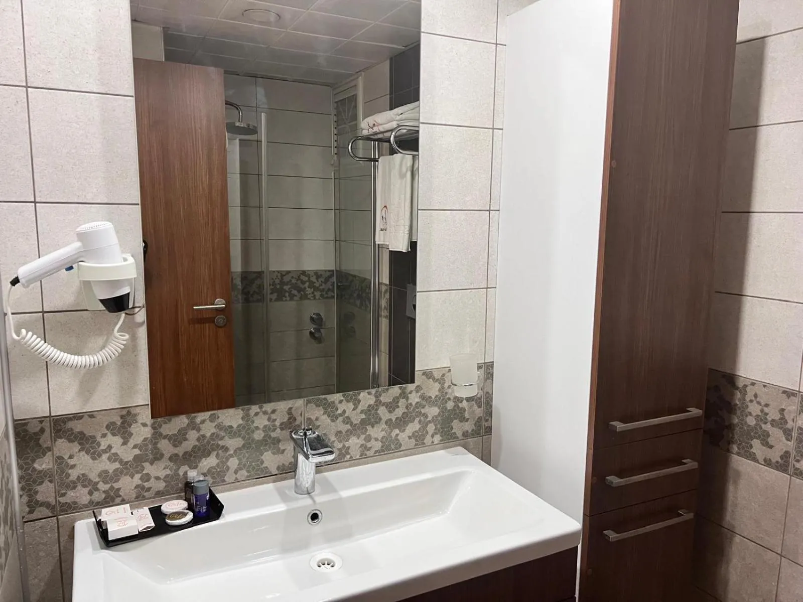 Shower in Liv Suit Hotel