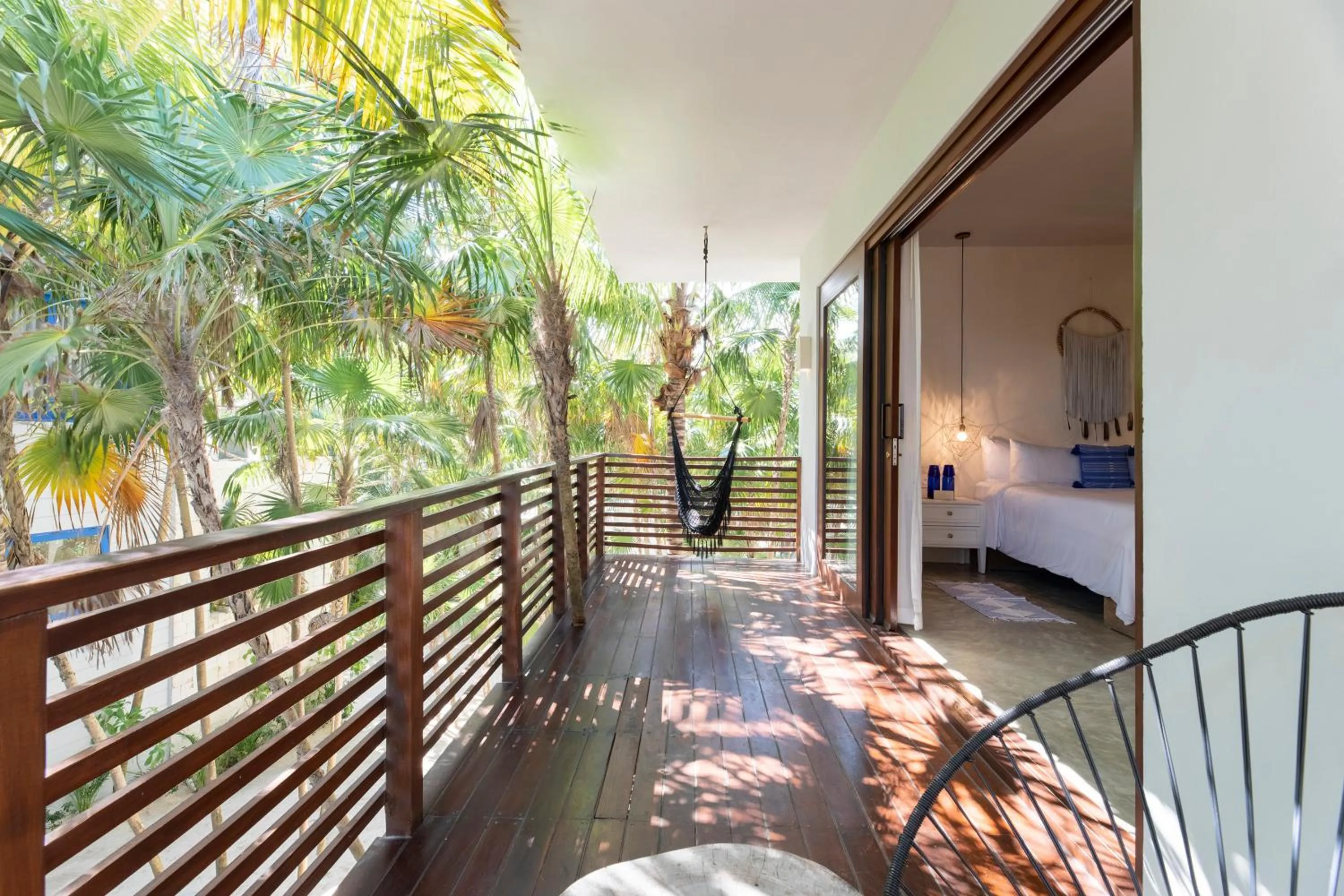 Bed in La Zebra Tulum, a Small Luxury Hotel