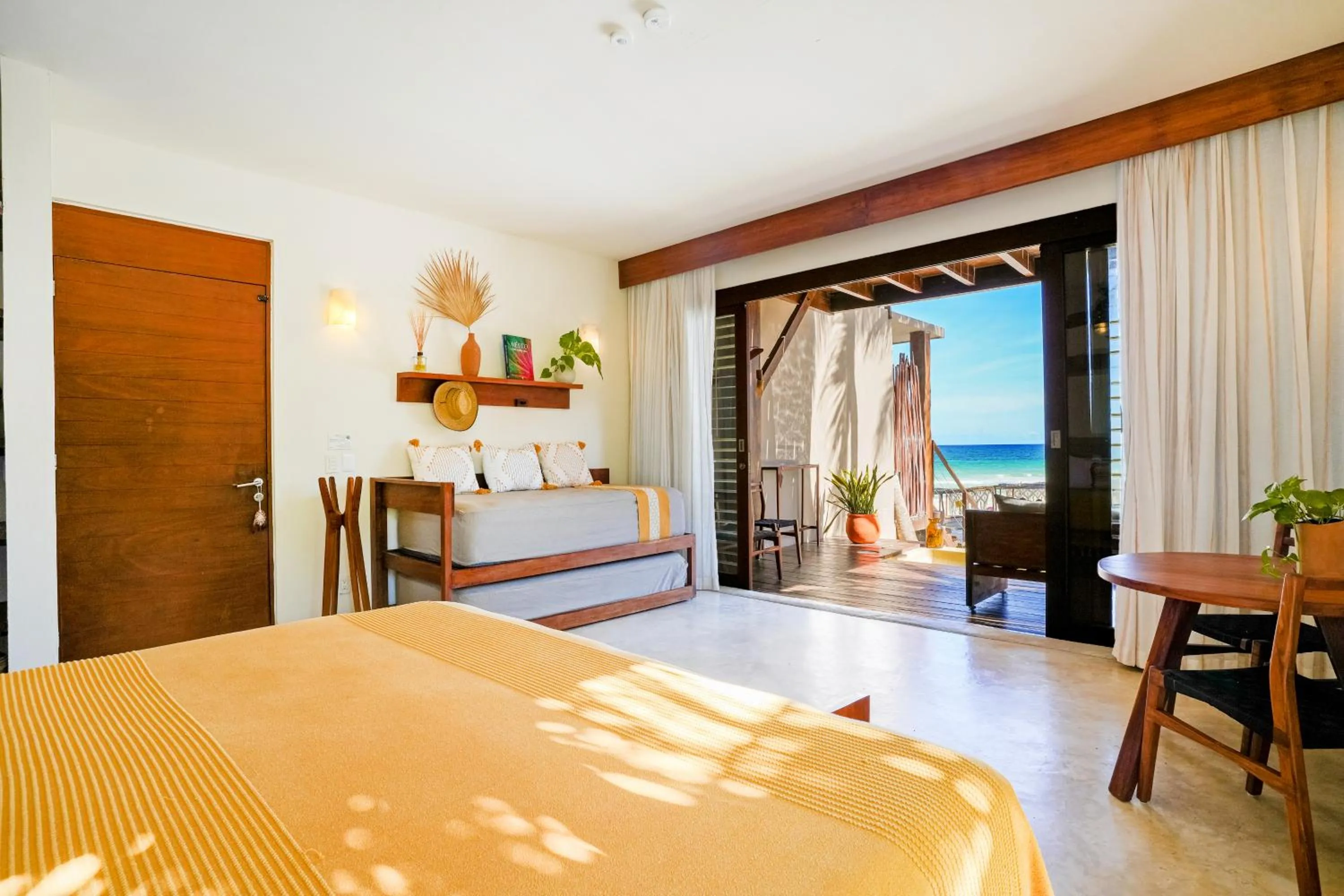 Bed in La Zebra Tulum, a Small Luxury Hotel