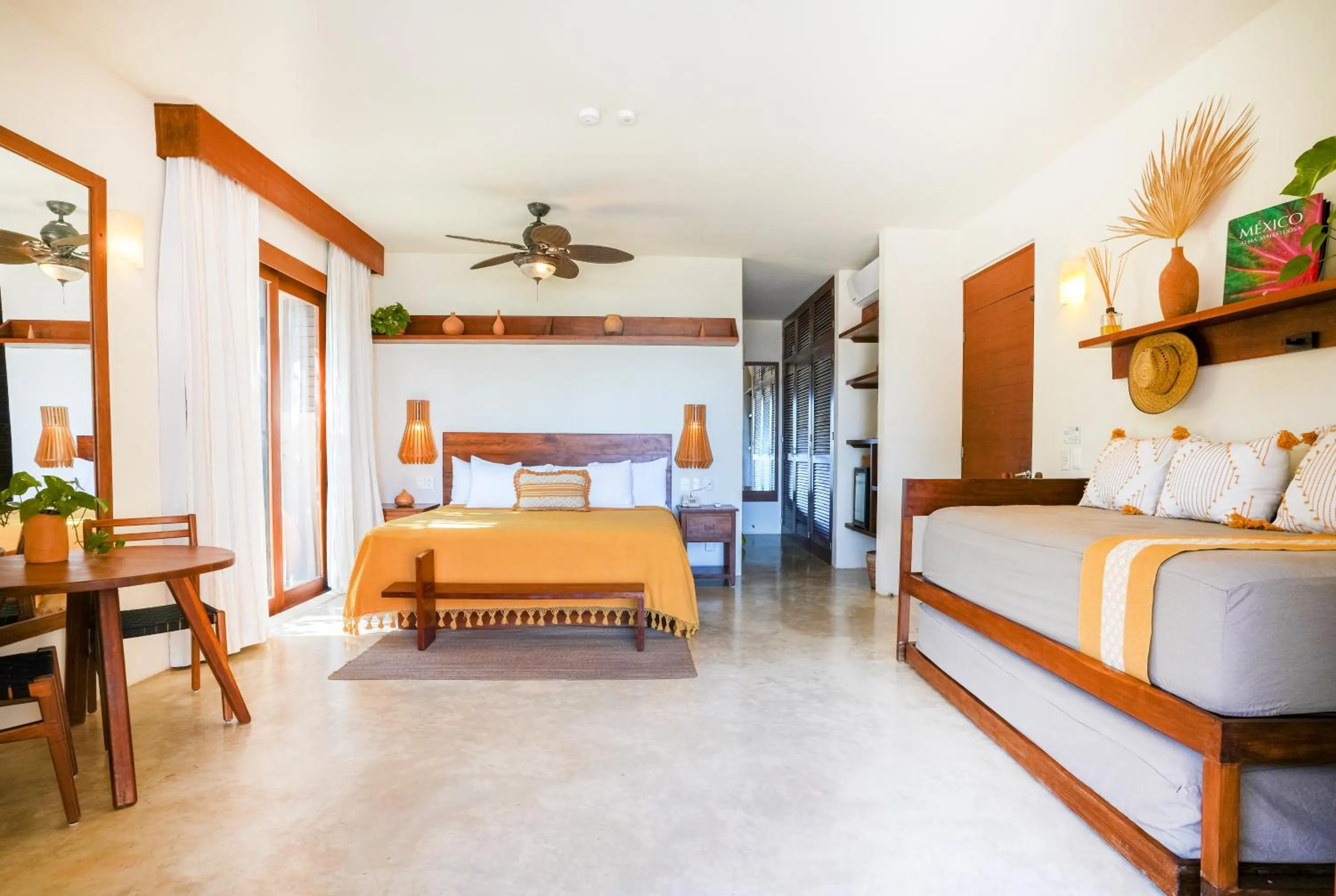 Bed in La Zebra Tulum, a Small Luxury Hotel