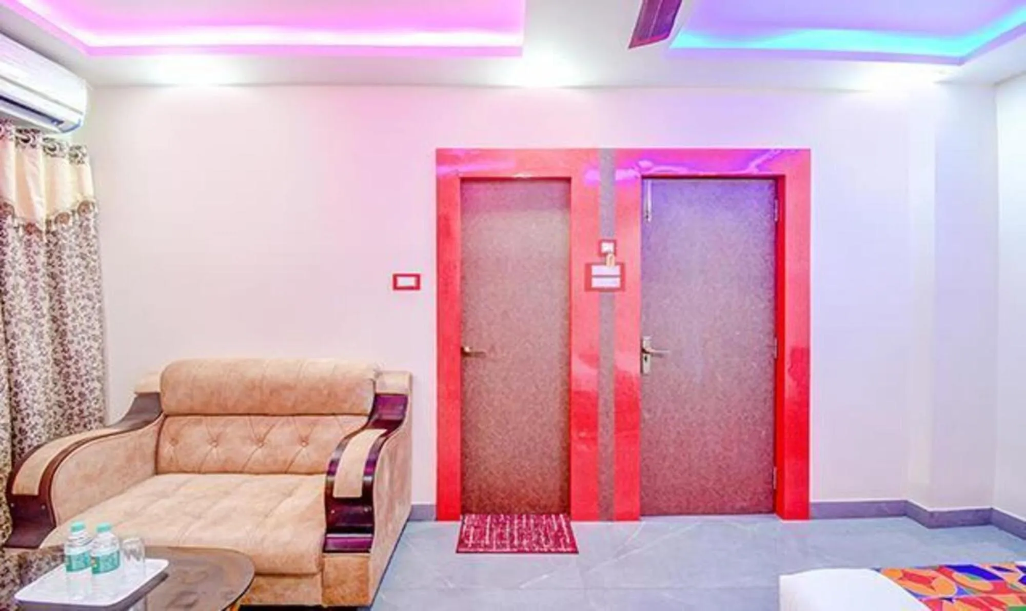 Seating area in FabHotel The Crown Comforts