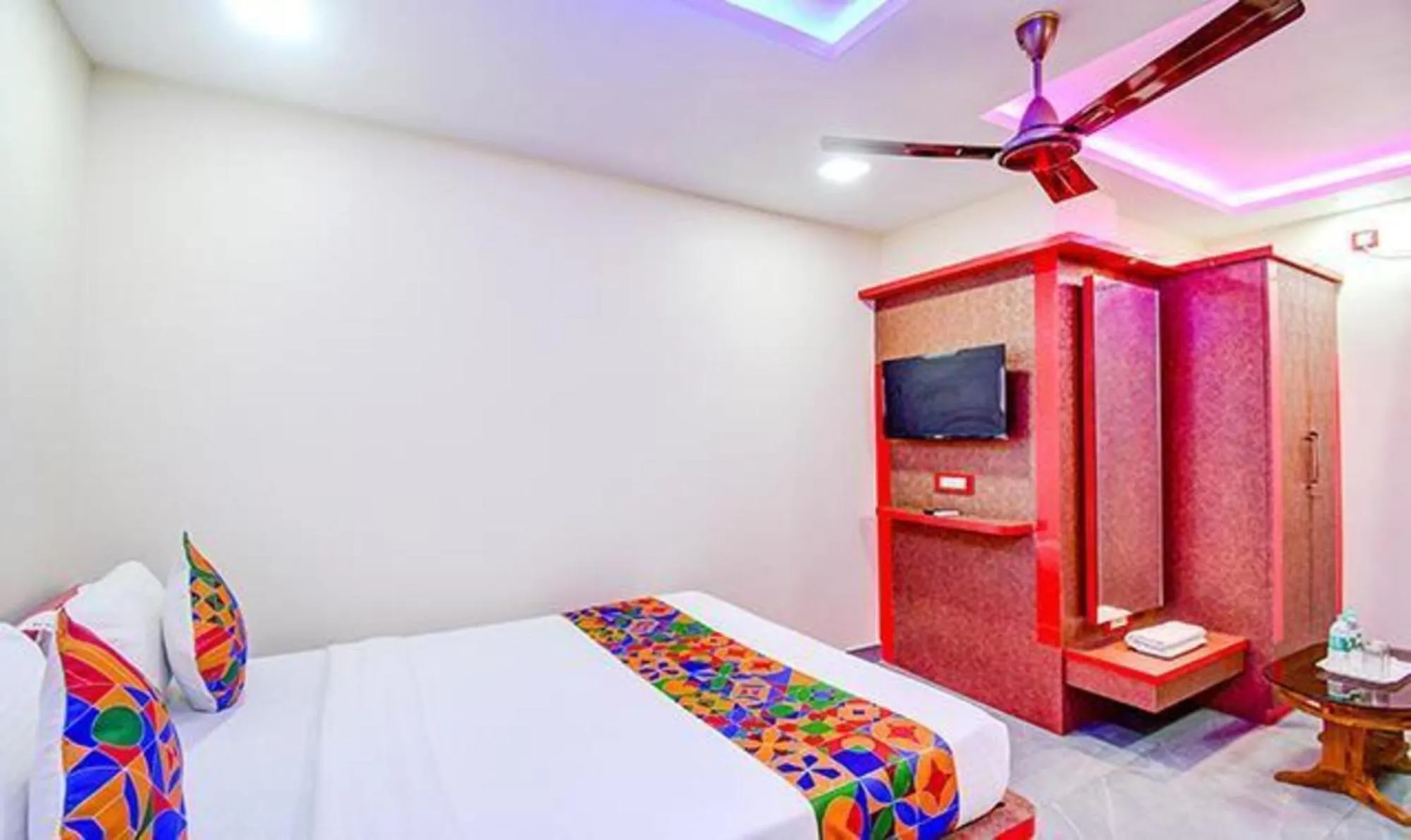 Bed in FabHotel The Crown Comforts