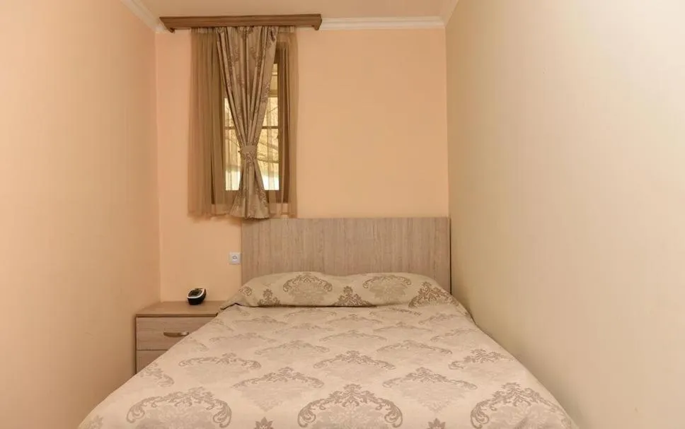 Bed in GreenWood Cottage