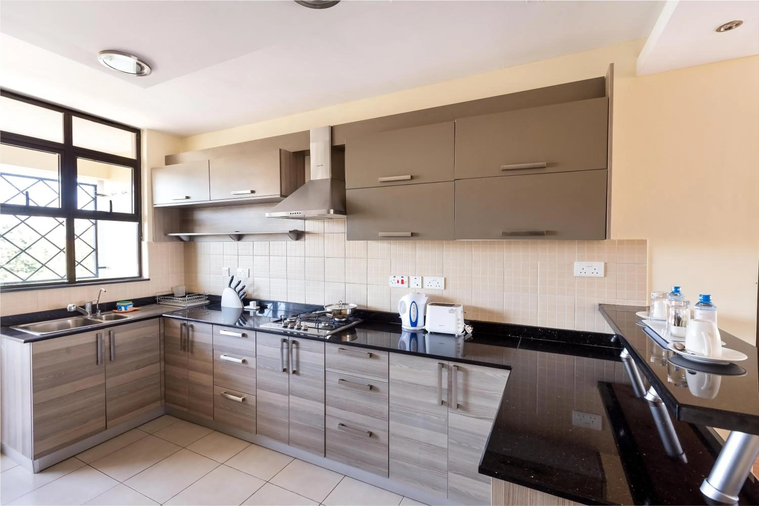 Kitchen or kitchenette in Fedha Residences by Trianum