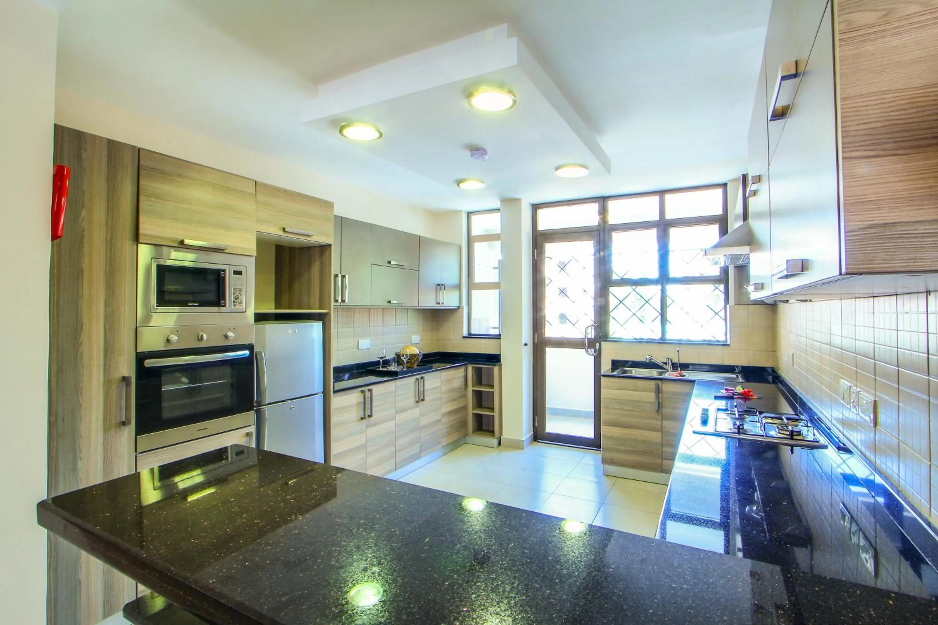 Kitchen or kitchenette in Fedha Residences by Trianum