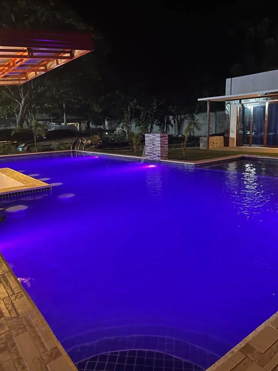 Swimming pool in Bluewaves Hostel & Villa Panagsama by Hiverooms