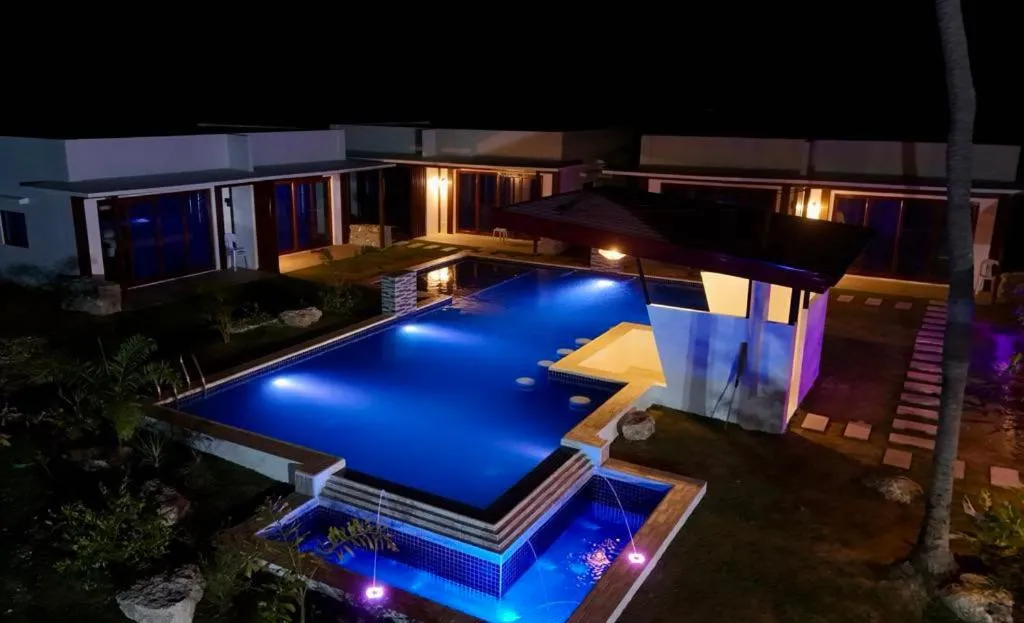 Swimming pool in Bluewaves Hostel & Villa Panagsama by Hiverooms