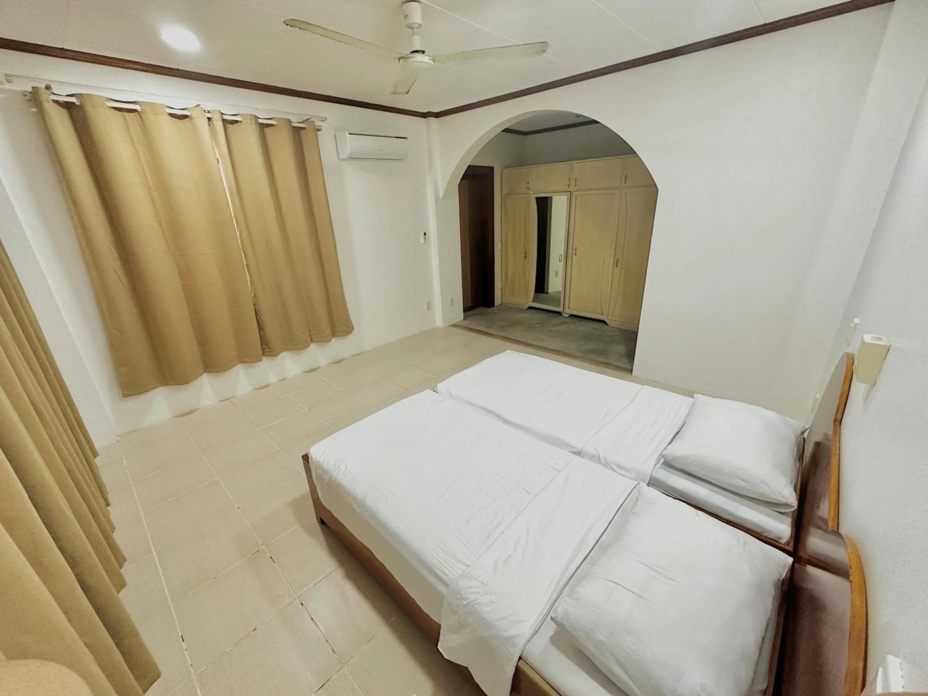 Photo of the whole room, Bed in Bluewaves Hostel & Villa Panagsama by Hiverooms