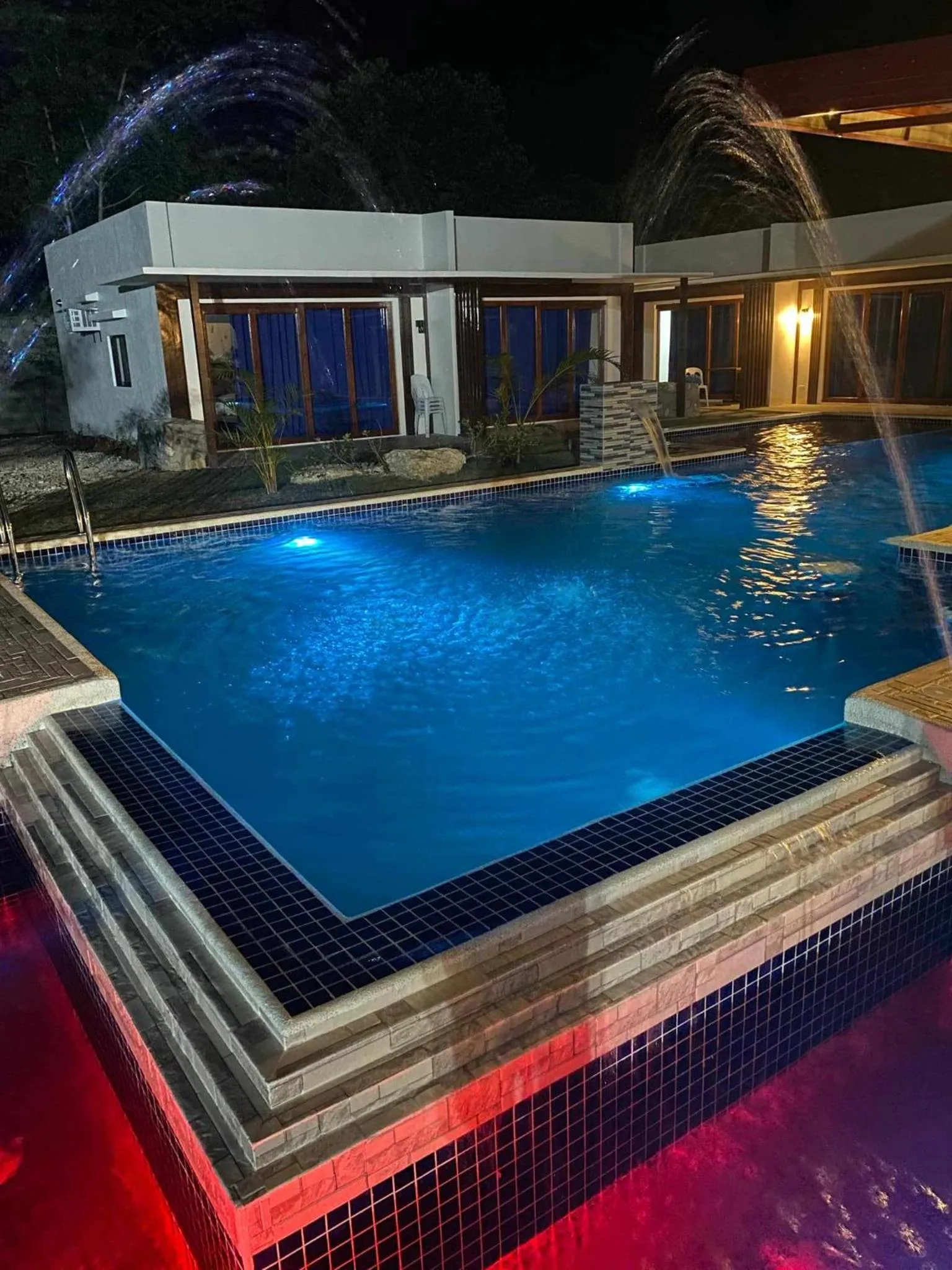 Swimming pool in Bluewaves Hostel & Villa Panagsama by Hiverooms