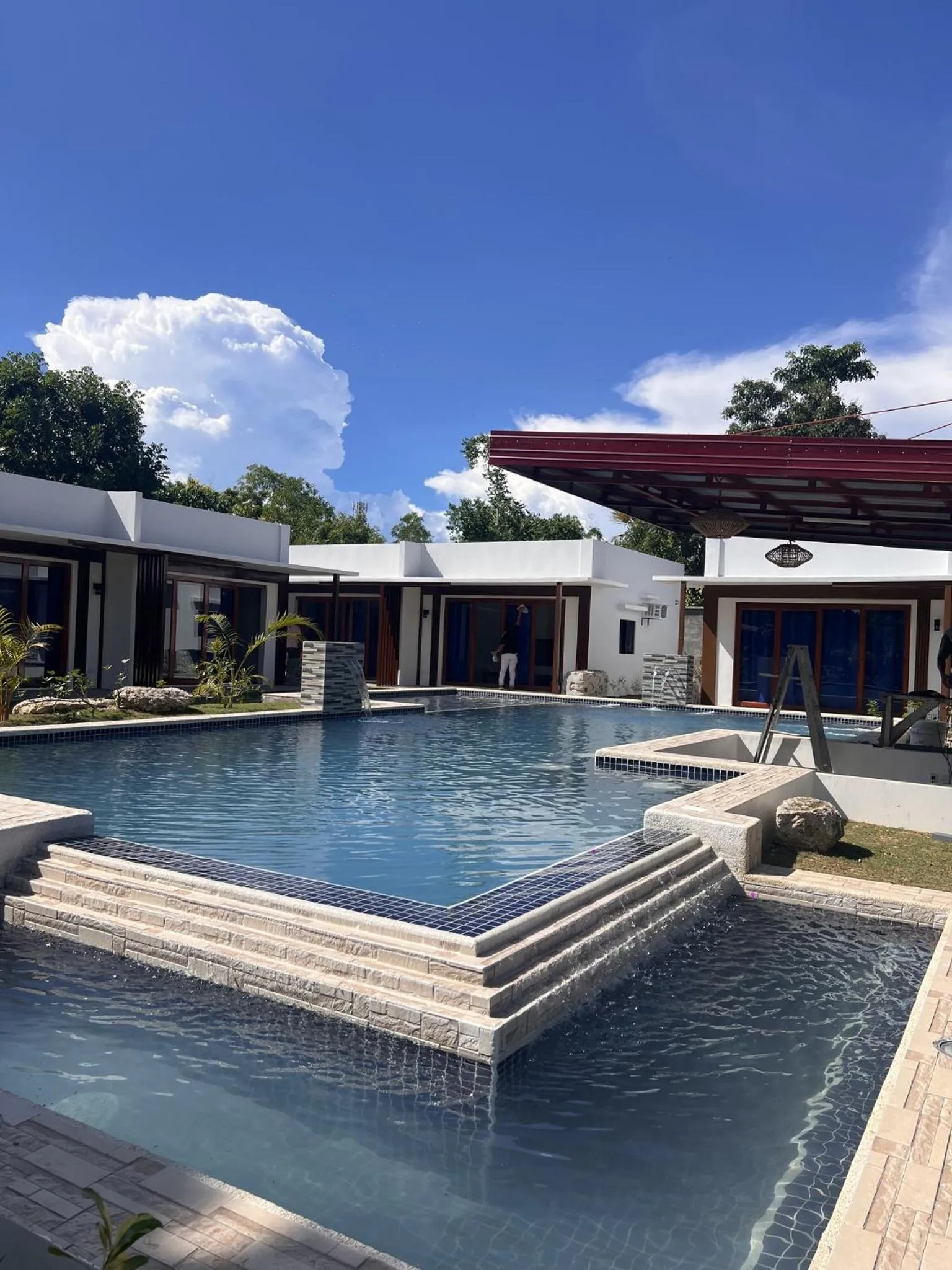 Swimming pool in Bluewaves Hostel & Villa Panagsama by Hiverooms