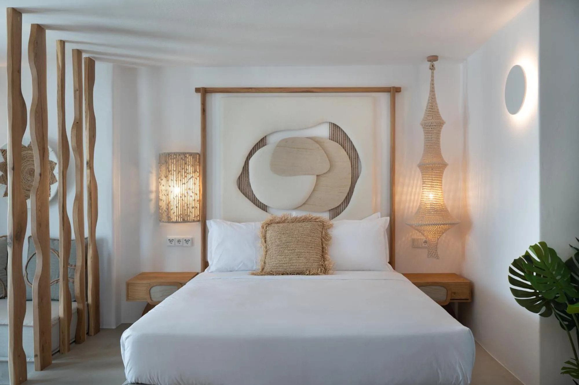 Bed in Kosmitis Suites & Villas