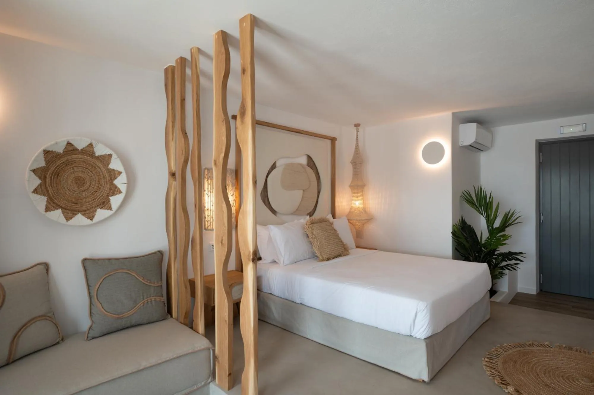 Bed in Kosmitis Suites & Villas