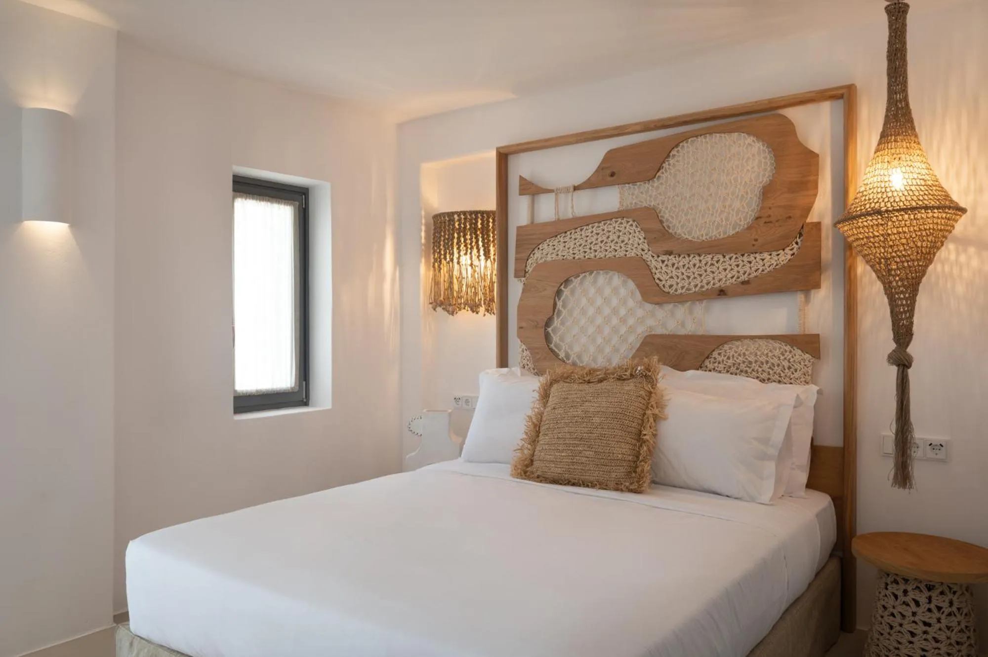 Bed in Kosmitis Suites & Villas