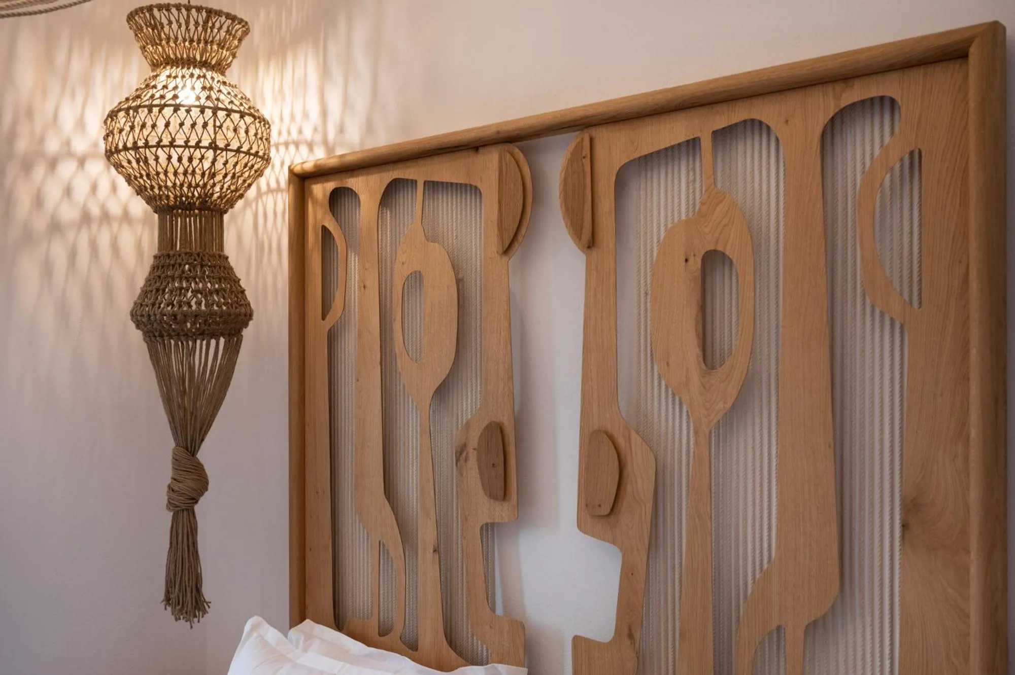 Bed in Kosmitis Suites & Villas