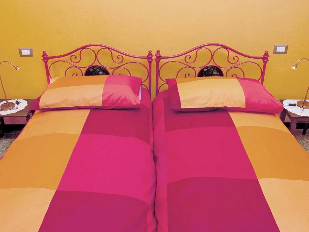 Bed in Le Coccinelle B&B