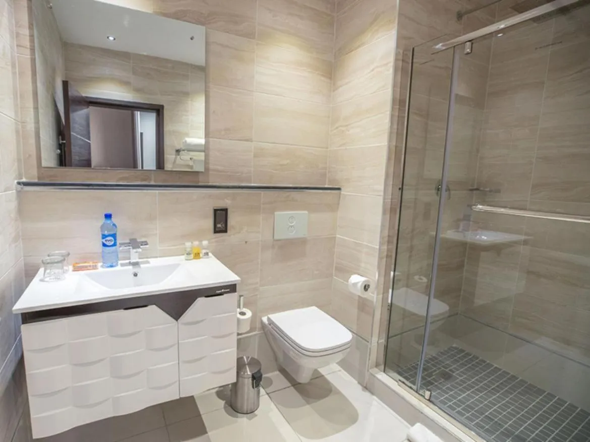 Bathroom in Tripod By Pedestal Hotel
